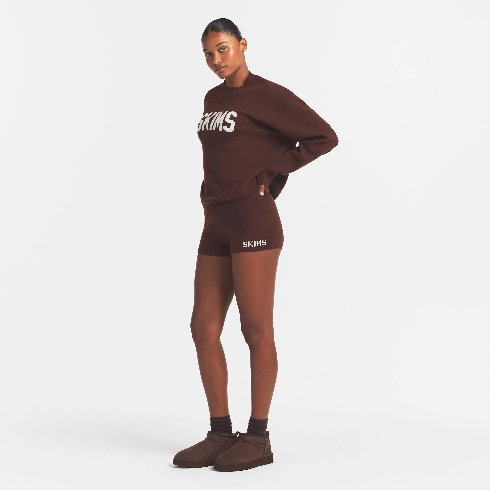 SWEATER KNIT LOGO SHORT | COCOA EGRET & LAYS FLAT ON A WHITE BACKGROUND | FLT @ | FOCUS: 0.0, 1.0, 0.9