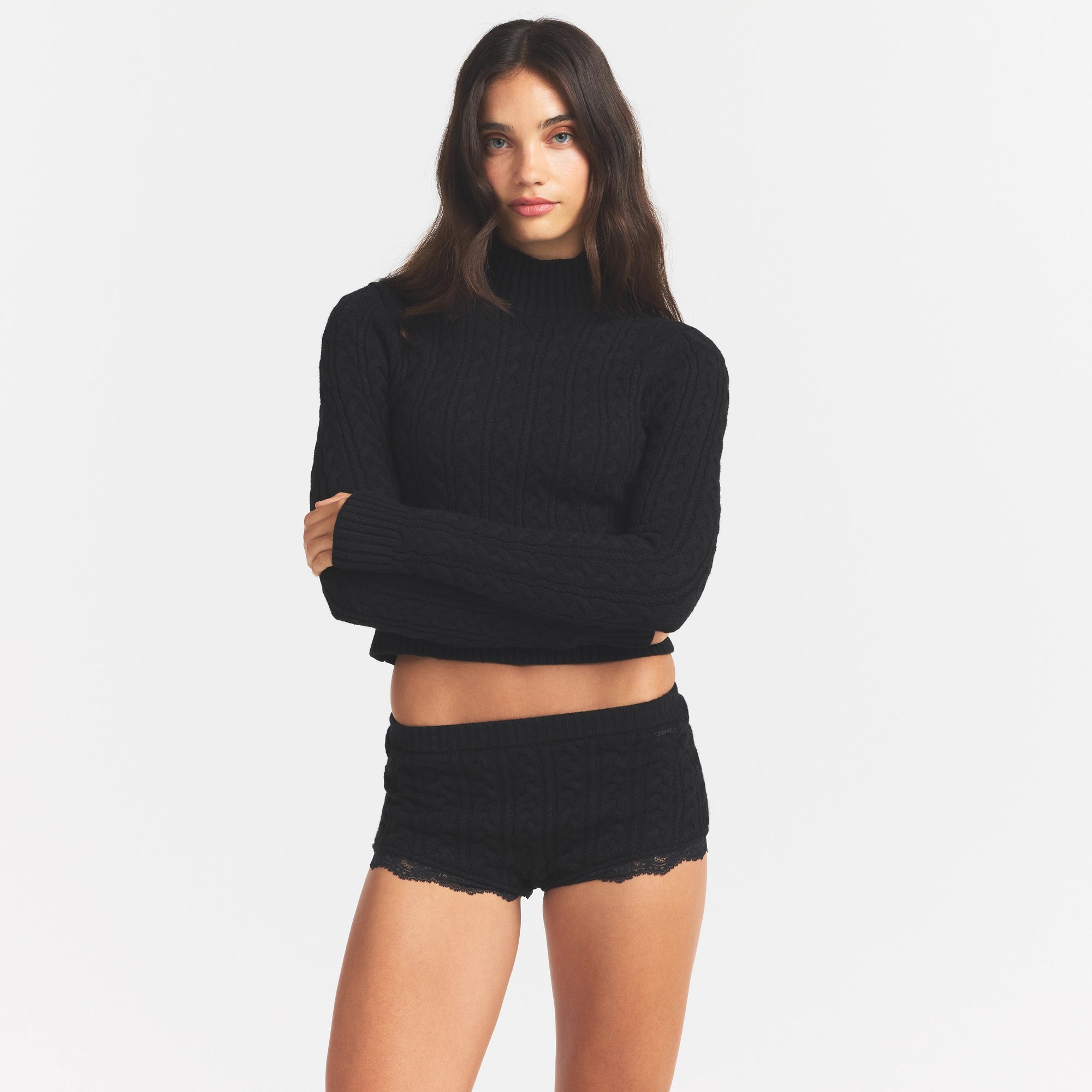 SWEATER KNIT SHORT | ONYX ON A MODEL SIDE VIEW @ | FOCUS: 0.0, 1.0, 0.9