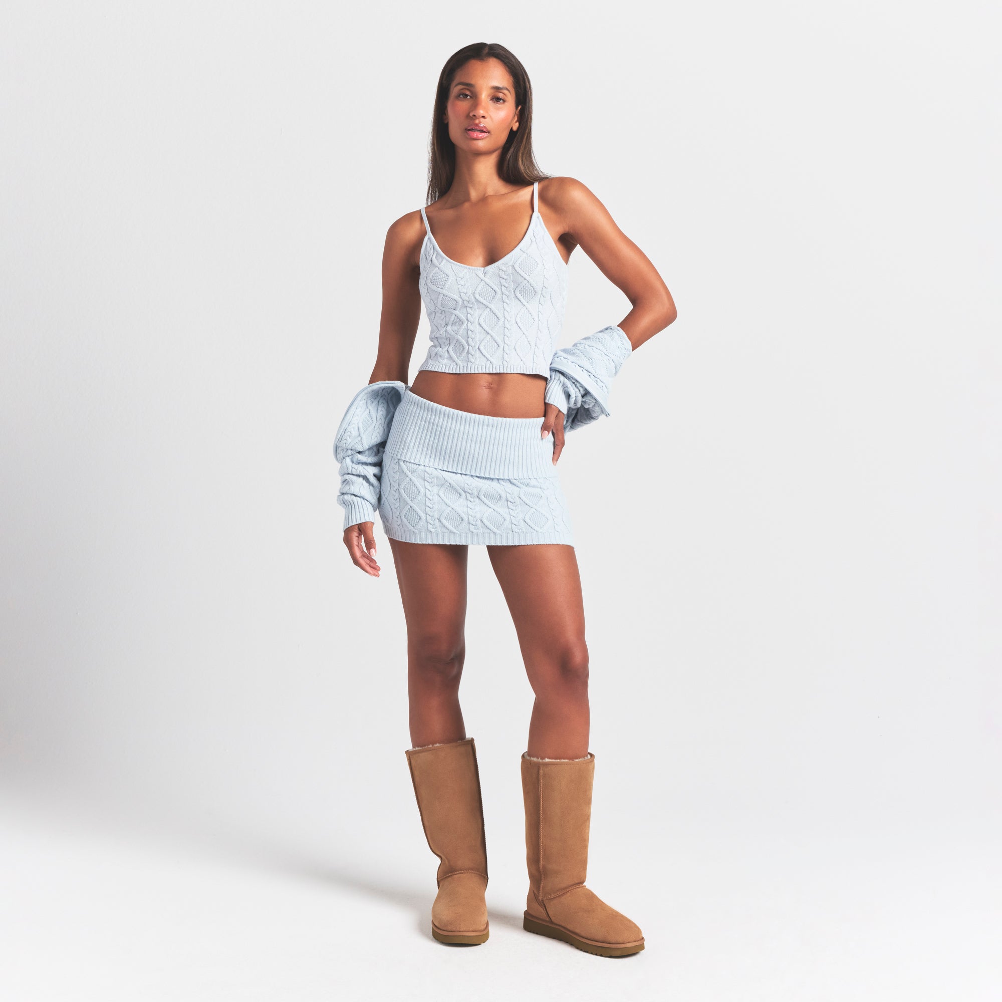 SWEATER KNITS CABLE MINI SKIRT | ZEN BLUE ON A MODEL FRONT VIEW @ | FOCUS: 0.0, 1.0, 0.9