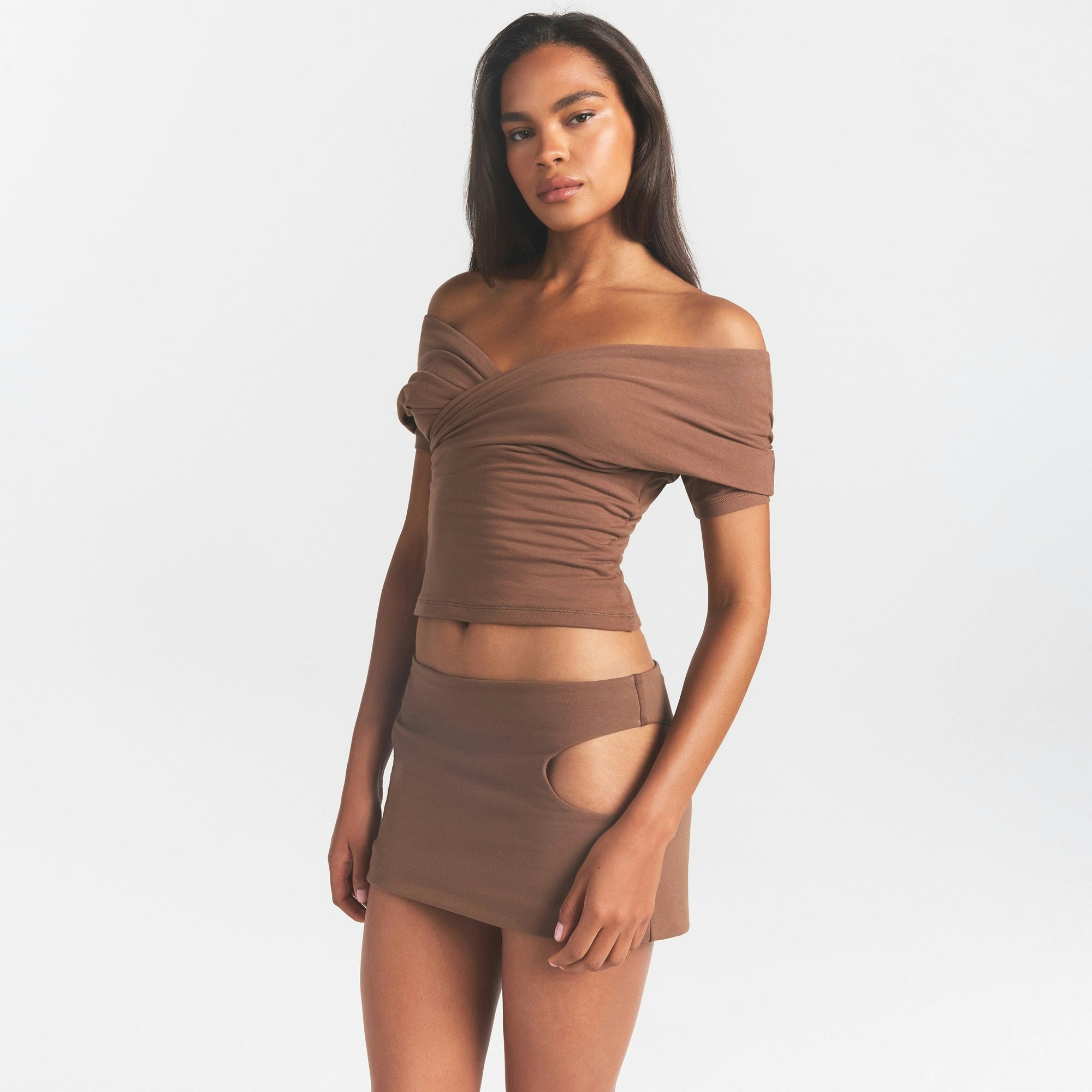 COTTON JERSEY CUT OUT MINI SKIRT | JASPER ON A MODEL SIDE VIEW @ | FOCUS: 0.0, 1.0, 0.9