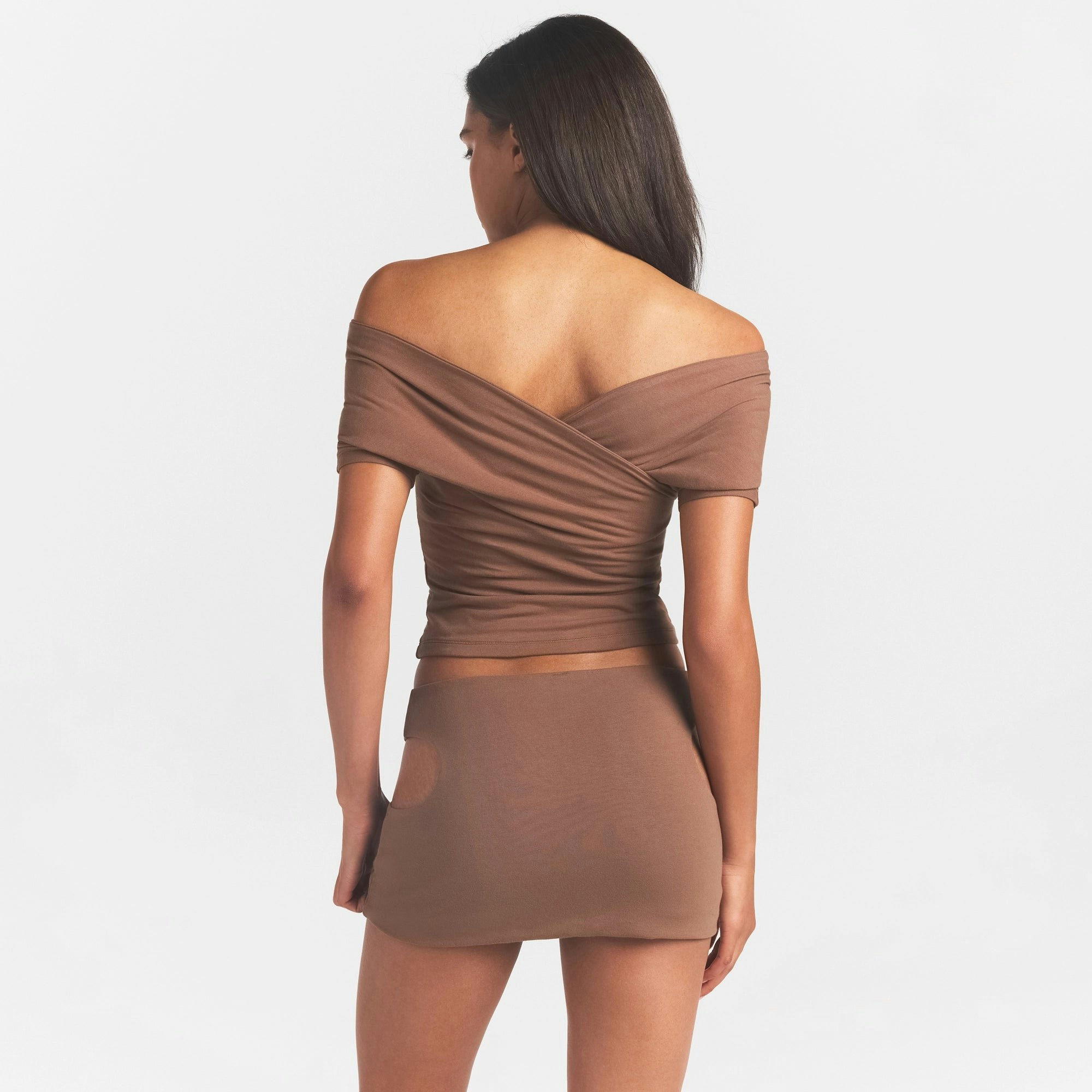 COTTON JERSEY CUT OUT MINI SKIRT | JASPER ON A MODEL SIDE VIEW @ | FOCUS: 0.0, 1.0, 0.9