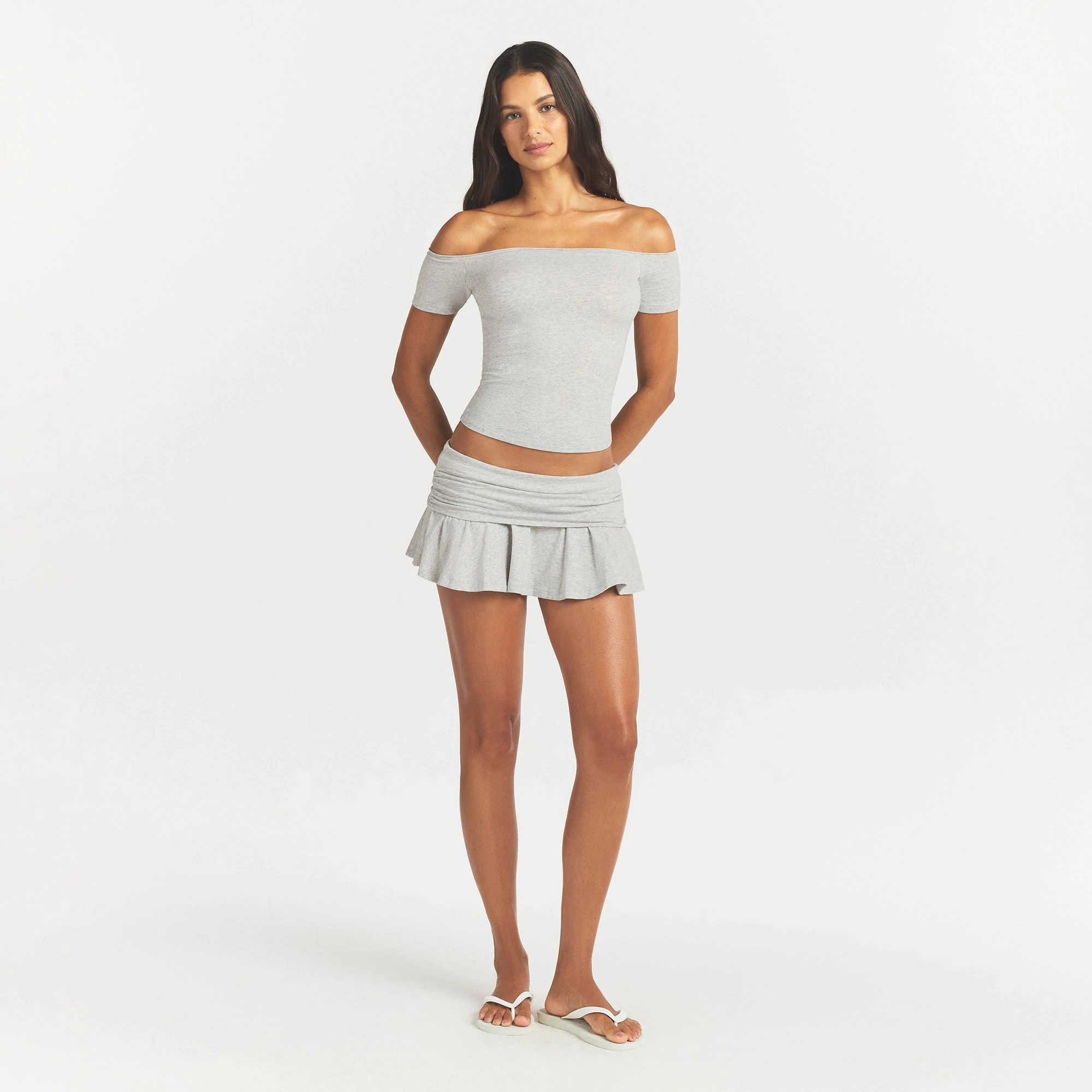 COTTON JERSEY FOLDOVER MINI SKORT | LIGHT HEATHER GREY ON A MODEL FRONT VIEW @ | FOCUS: 0.0, 1.0, 0.9