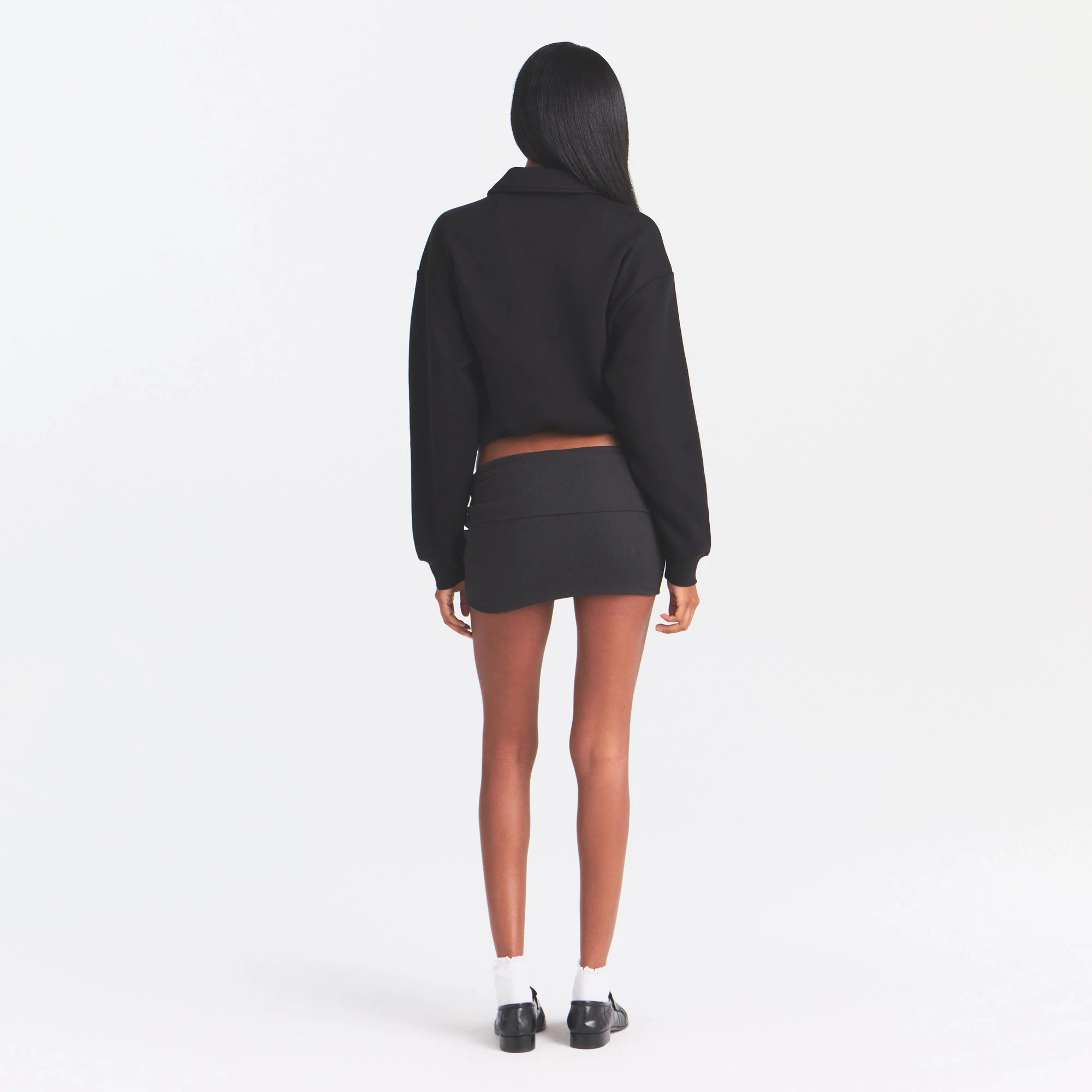 COTTON RIB FOLDOVER MINI SKIRT | SOOT ON A MODEL | FOCUS: 0.0, 1.0, 0.9