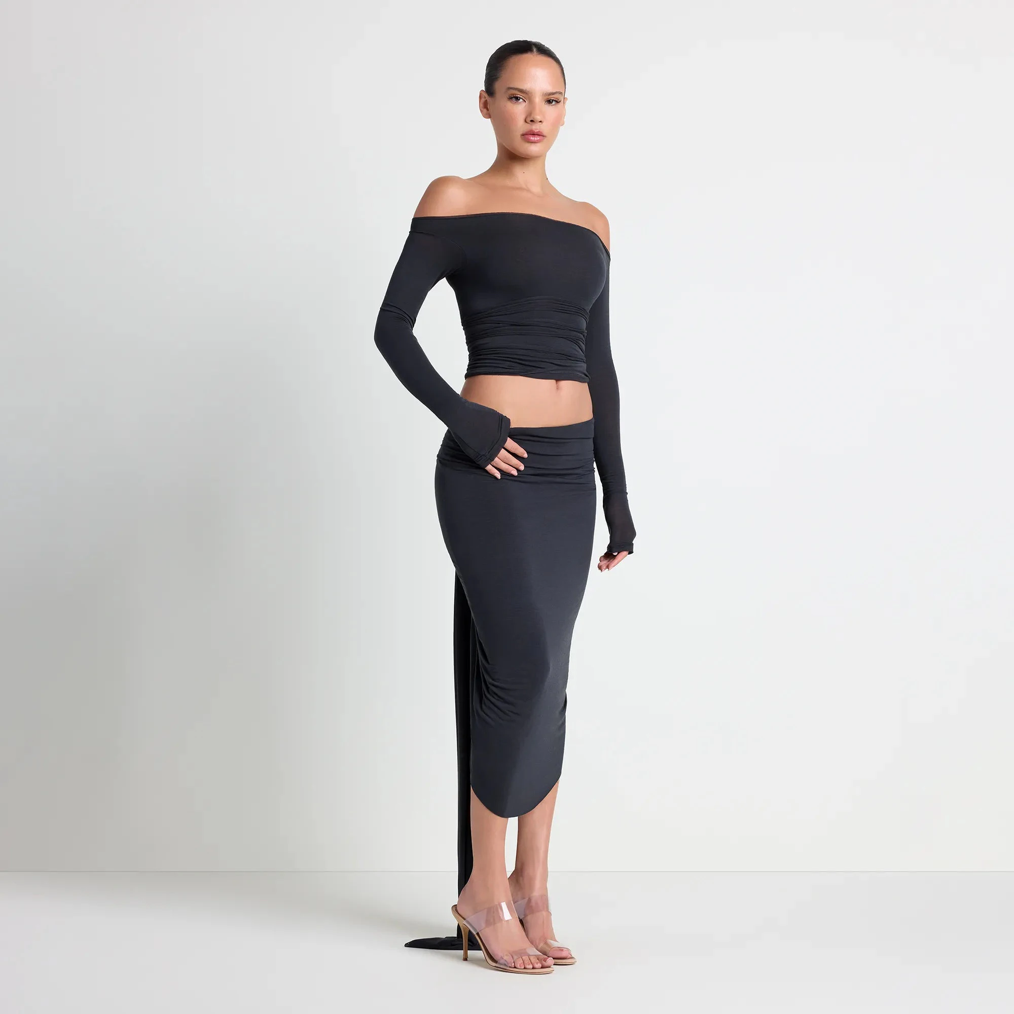 VETTESE X SKIMS SHEER MODAL DRAPED MIDI SKIRT | ONYX ON A MODEL SIDE VIEW| FOCUS: 0.0, 1.0, 0.9