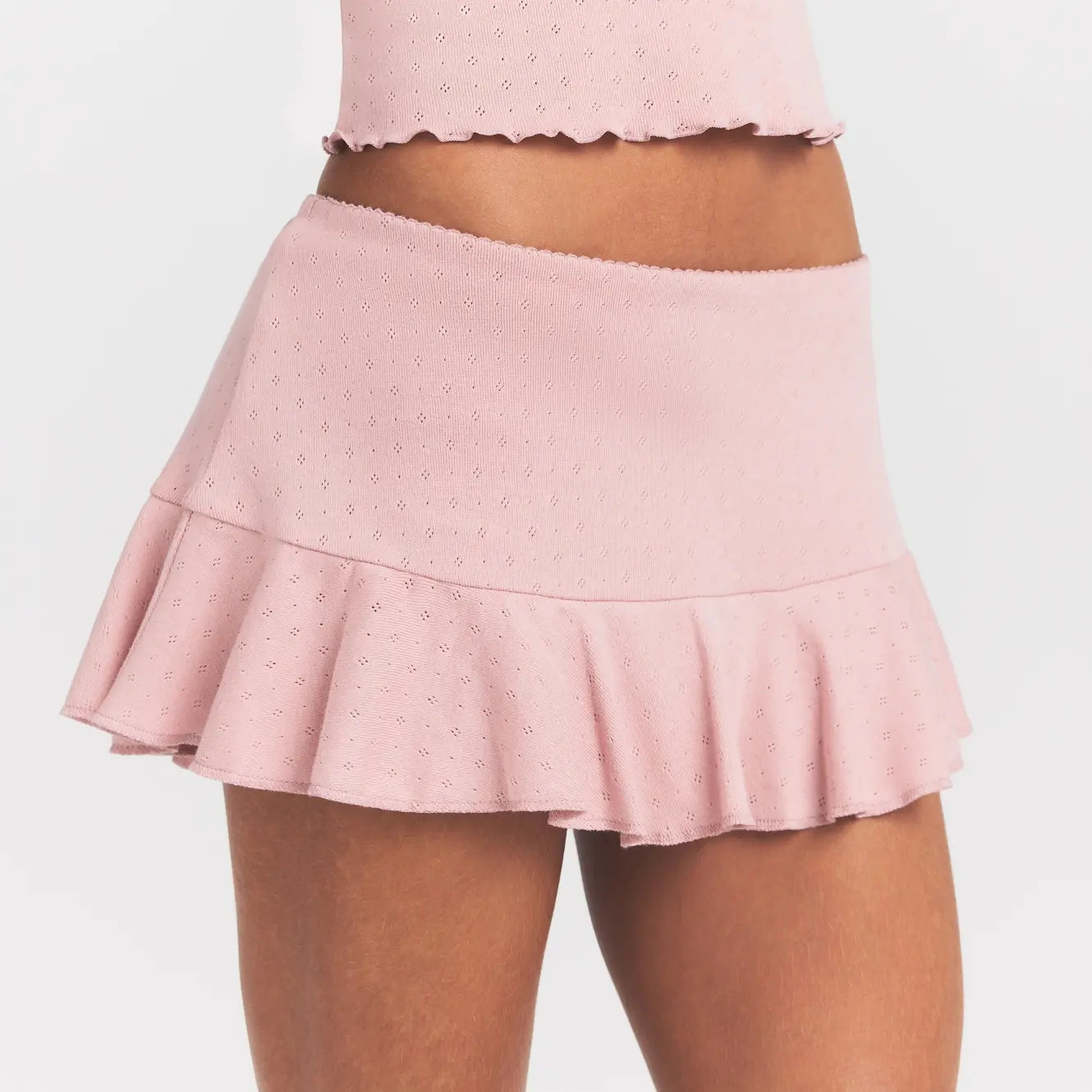HEAVY POINTELLE MINI SKORT | MORGANITE ON A MODEL SIDE VIEW