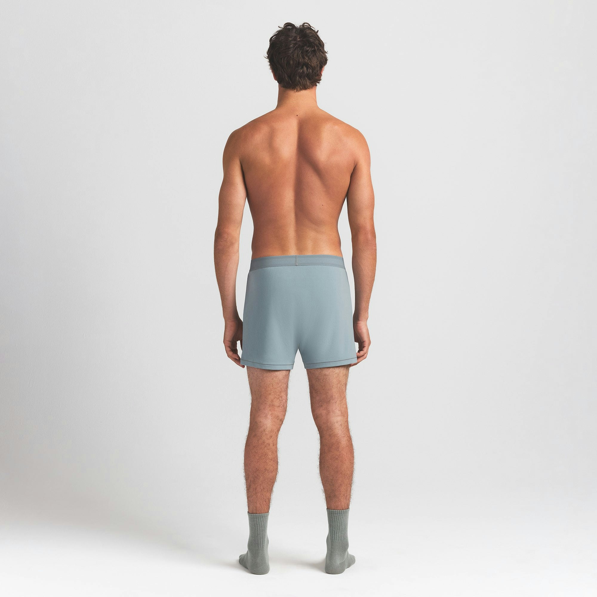 SKIMS COTTON MENS KNIT BOXER | SKY ON A MODEL BACK VIEW @ | FOCUS: 0.0, 1.0, 0.9