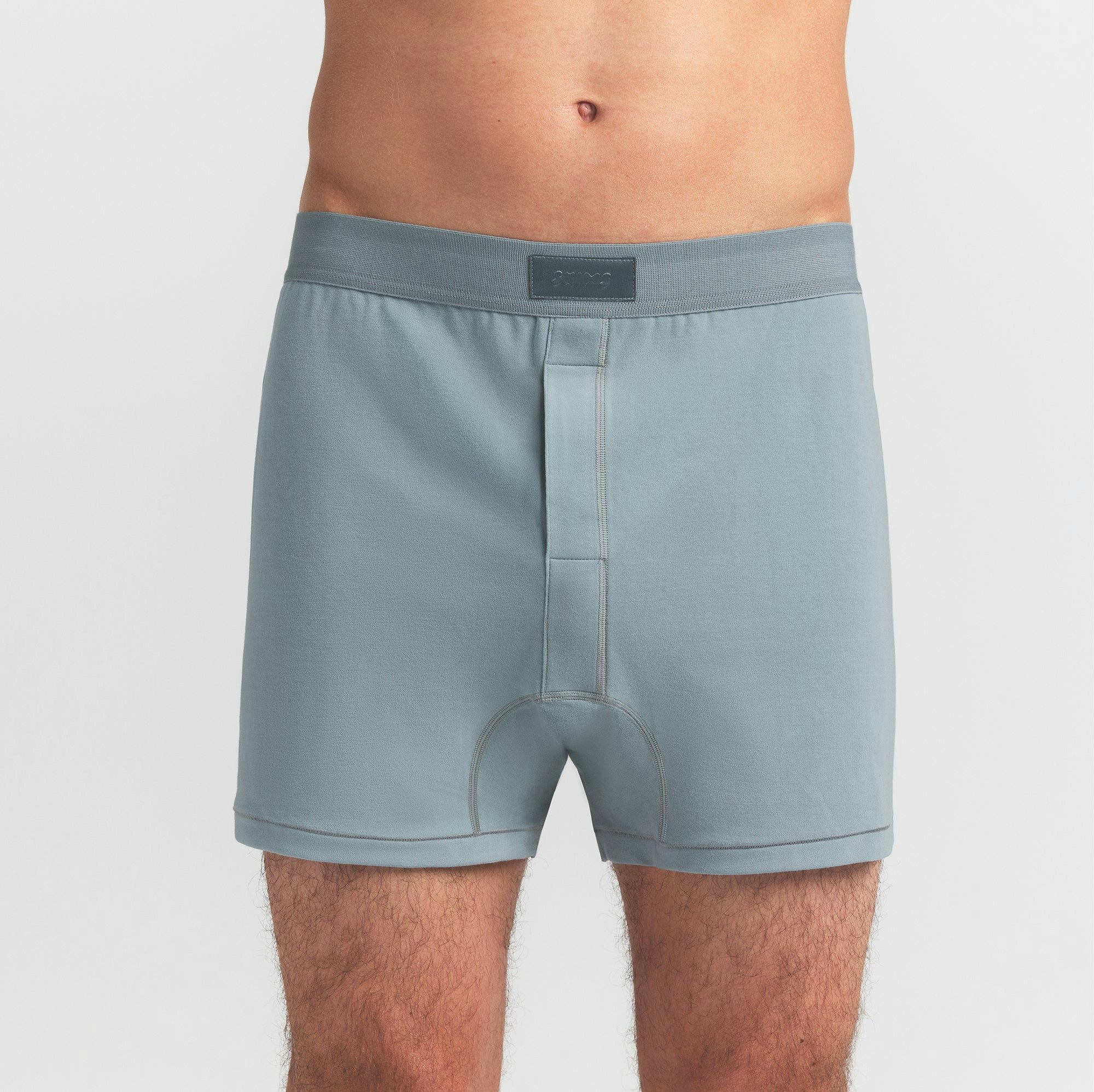 SKIMS COTTON MENS KNIT BOXER 3-PACK | VERDANT MULTI ON A MODEL FRONT VIEW @ | FOCUS: 0.0, 1.0, 0.9