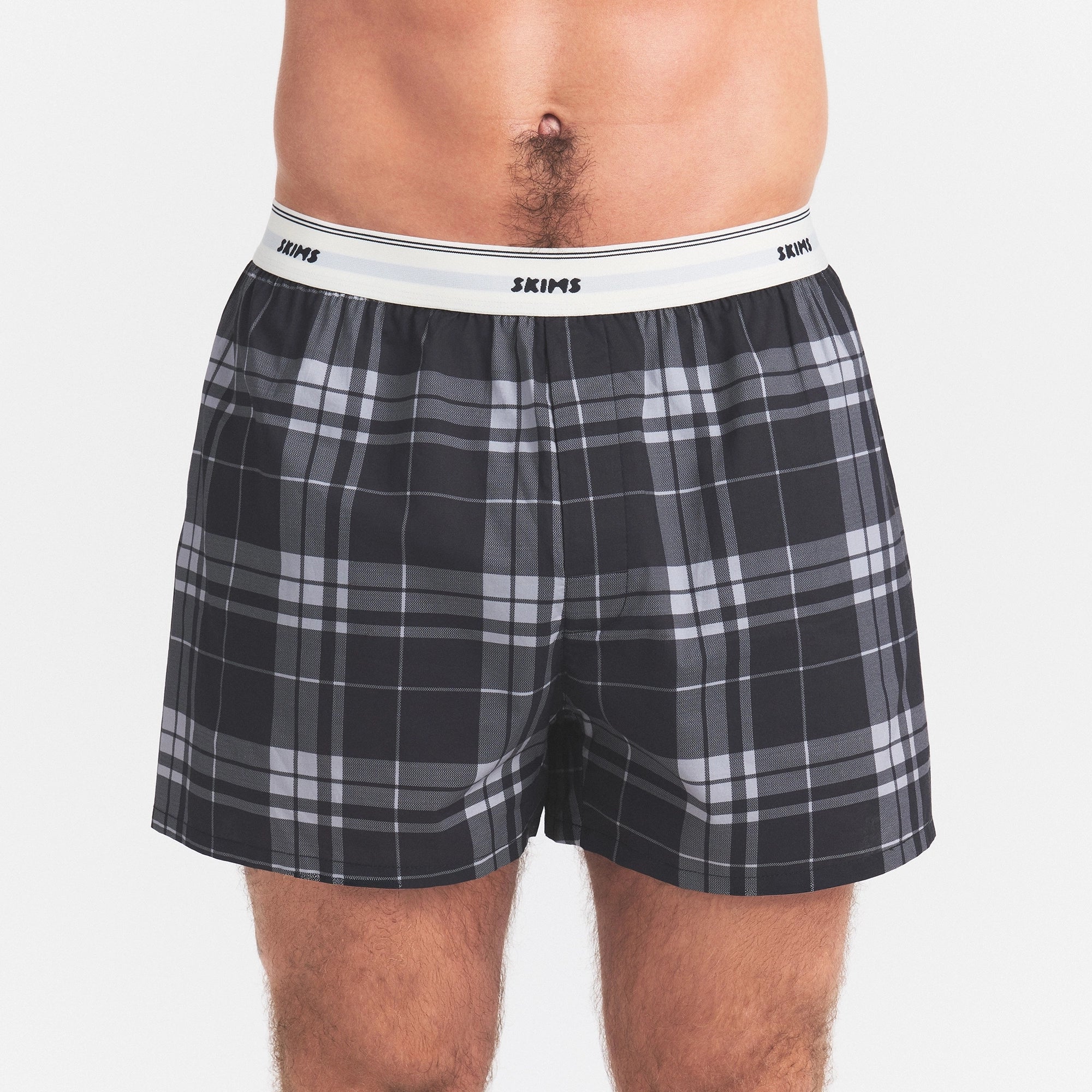 COTTON POPLIN MENS LOGO BAND BOXER | MIRROR CABIN PLAID ON A MODEL SIDE VIEW @ | FOCUS: 0.0, 1.0, 0.9