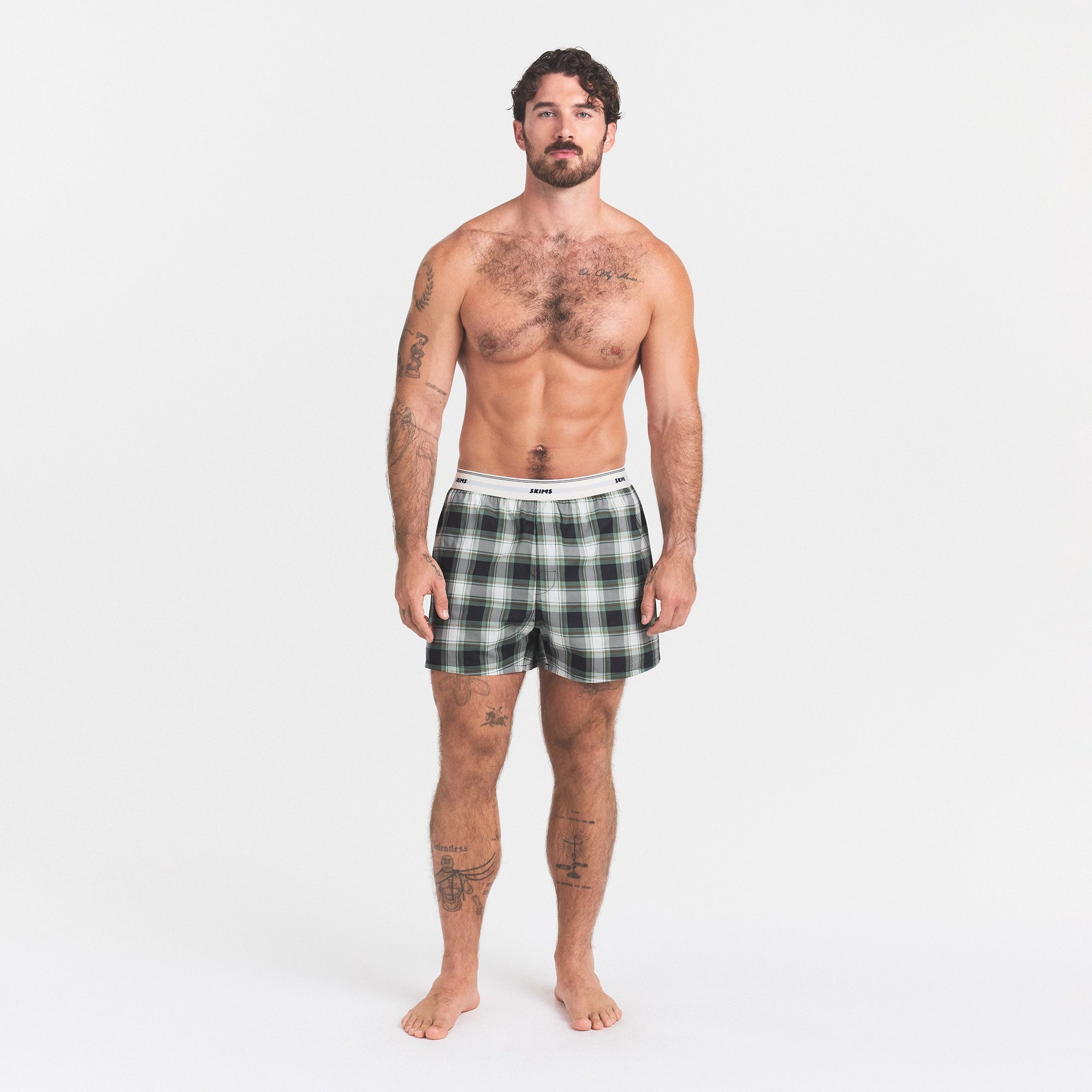 COTTON POPLIN MENS LOGO BAND BOXER | ONYX FESTIVE TARTAN ON A MODEL FRONT VIEW @ | FOCUS: 0.0, 1.0, 0.9