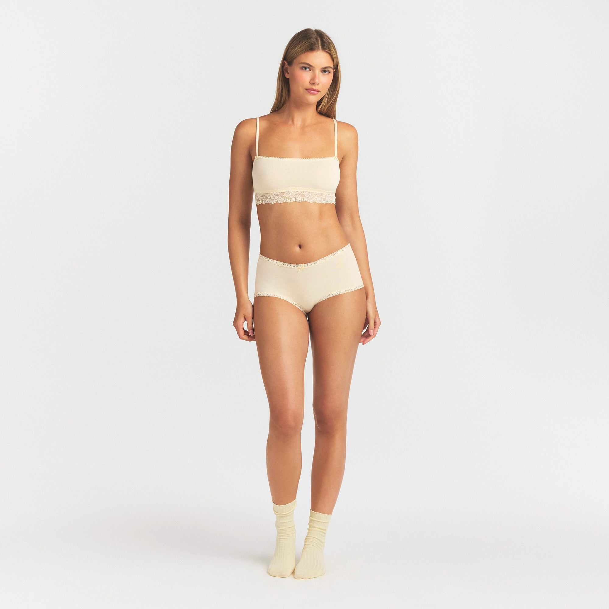 LIGHTWEIGHT COTTON LACE BOY SHORT | BUTTER TONAL ON A MODEL FRONT VIEW @ | FOCUS: 0.0, 1.0, 0.9