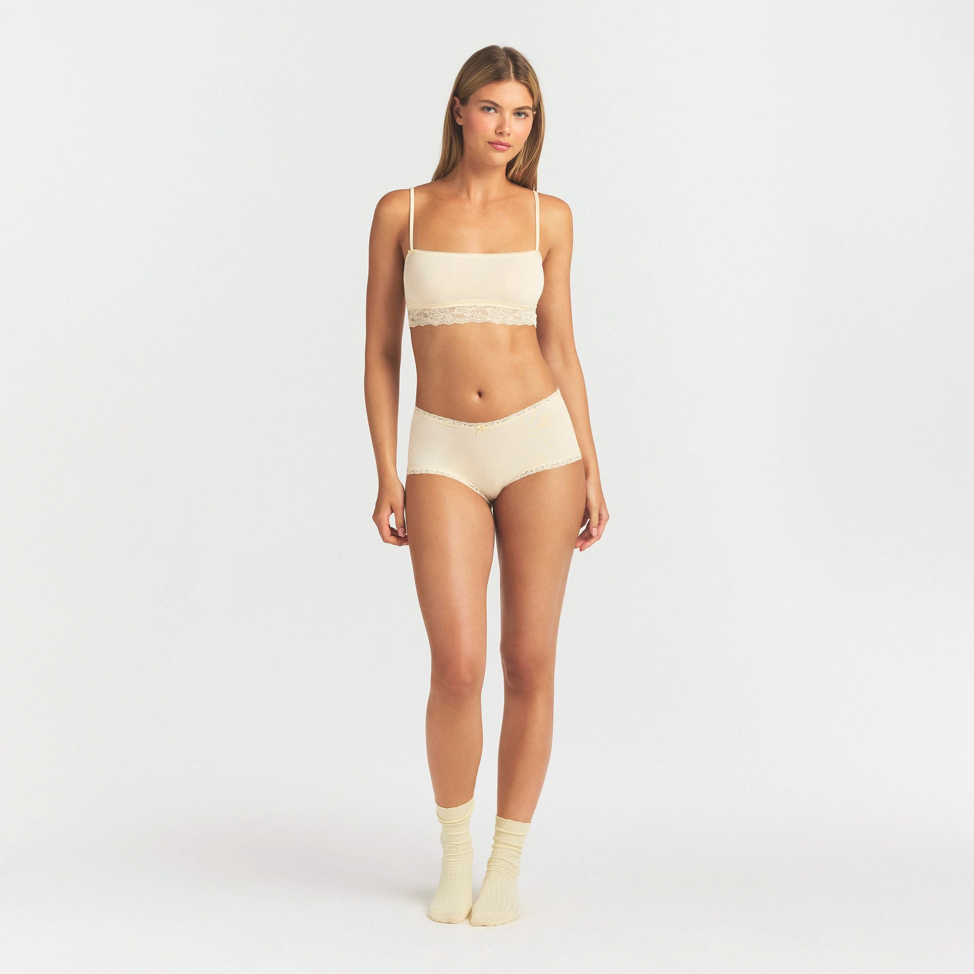 LIGHTWEIGHT COTTON LACE BOY SHORT | BUTTER TONAL ON A MODEL FRONT VIEW @ | FOCUS: 0.0, 1.0, 0.9