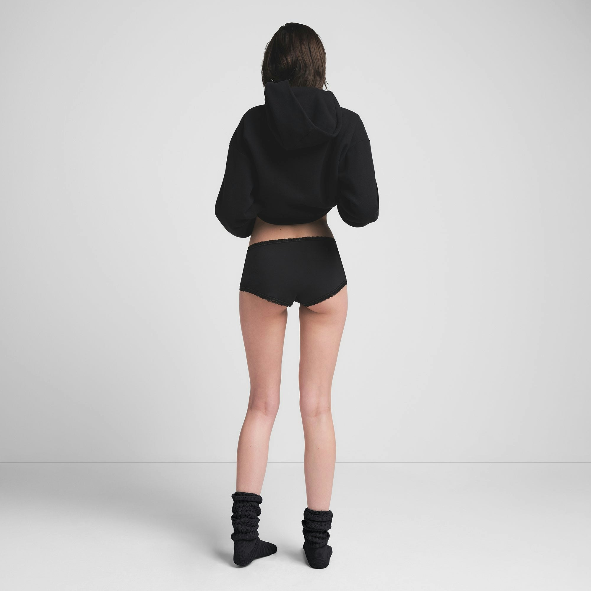 LIGHTWEIGHT COTTON LACE TRIM BOY SHORT | SOOT ON A MODEL BACK VIEW @ | FOCUS: 0.0, 1.0, 0.9