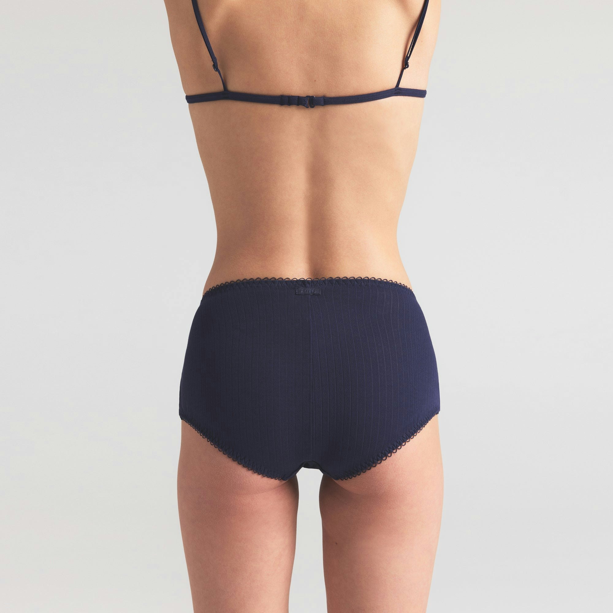 POINTELLE BOY SHORT | WILDFLOWER ON A MODEL SIDE VIEW | FOCUS: 0.0, 1.0, 0.9