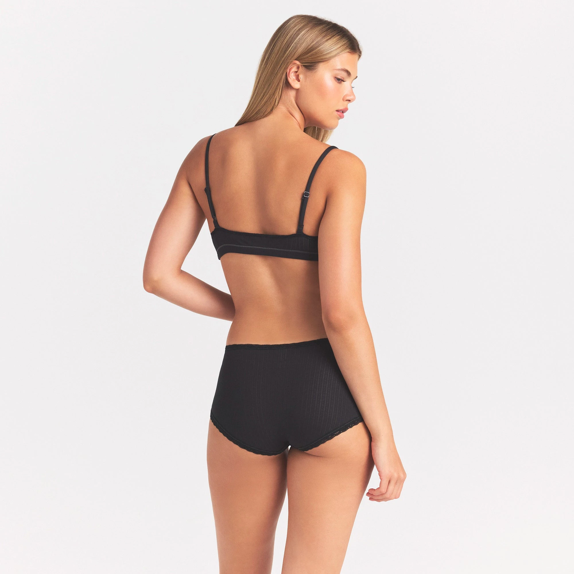 LIGHTWEIGHT COTTON POINTELLE LACE BOY SHORT | SOOT TONAL ON A MODEL SIDE VIEW @ | FOCUS: 0.0, 1.0, 0.9