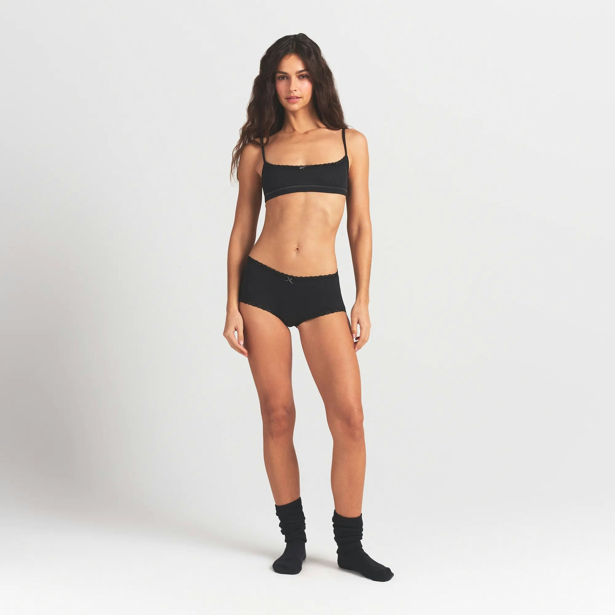 LIGHTWEIGHT COTTON POINTELLE LACE BOY SHORT | SOOT TONAL ON A MODEL FRONT VIEW