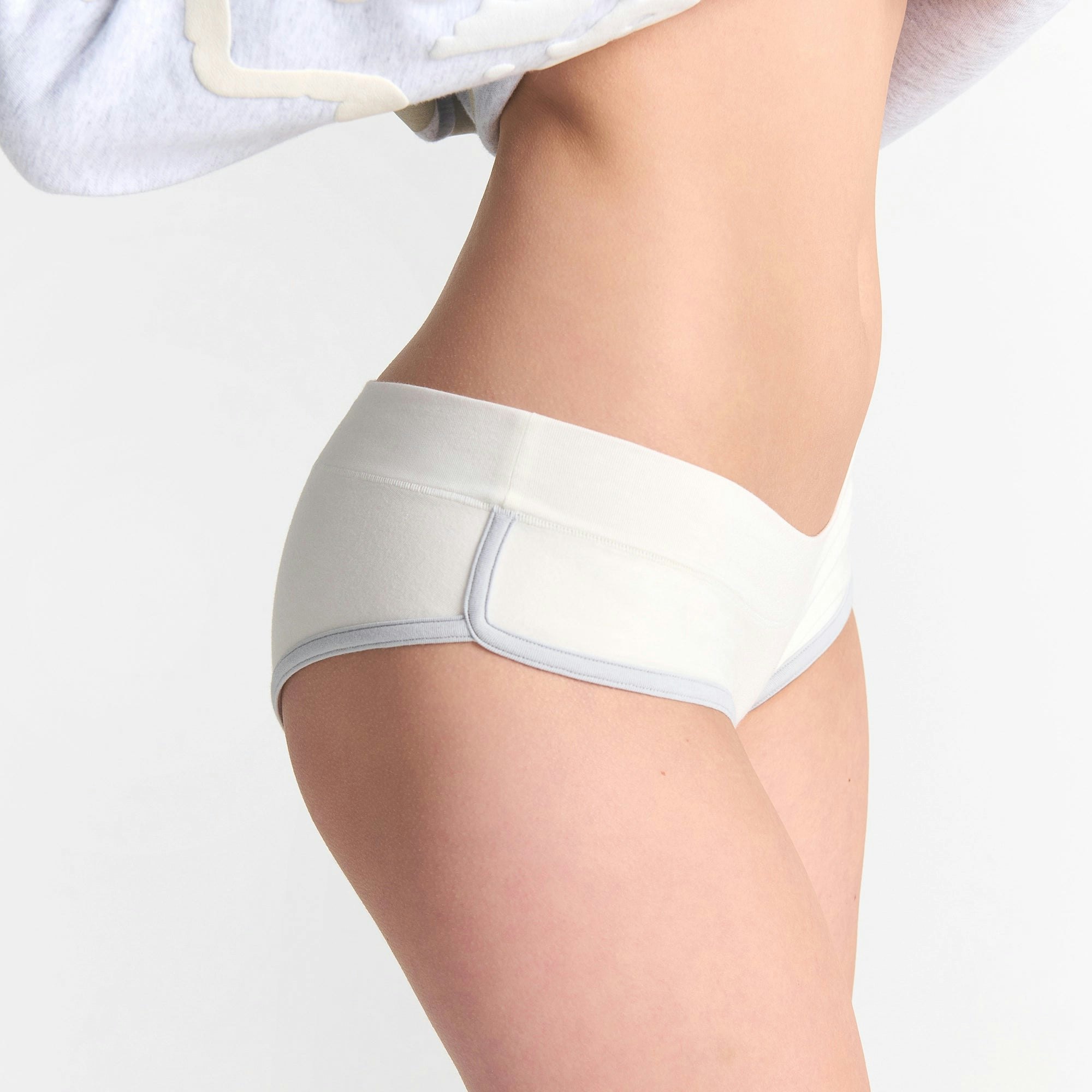 CACTUS PLANT FLEA MARKET X SKIMS COTTON JERSEY MICRO BOY SHORT 3-PACK | YUMMY MULTI ON A MODEL SIDE VIEW @ | FOCUS: 0.0, 1.0, 0.9