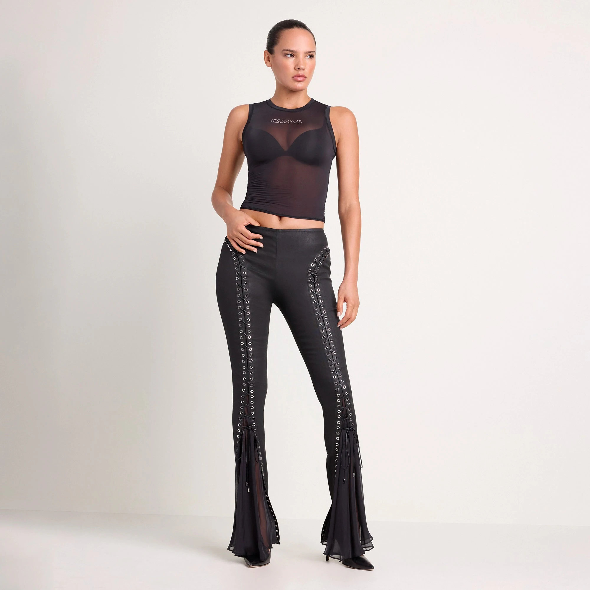 LUDOVIC DE SAINT SERNIN X SKIMS WAXED COTTON PANT | ONYX ON A MODEL FRONT VIEW @ | FOCUS: 0.0, 1.0, 0.9
