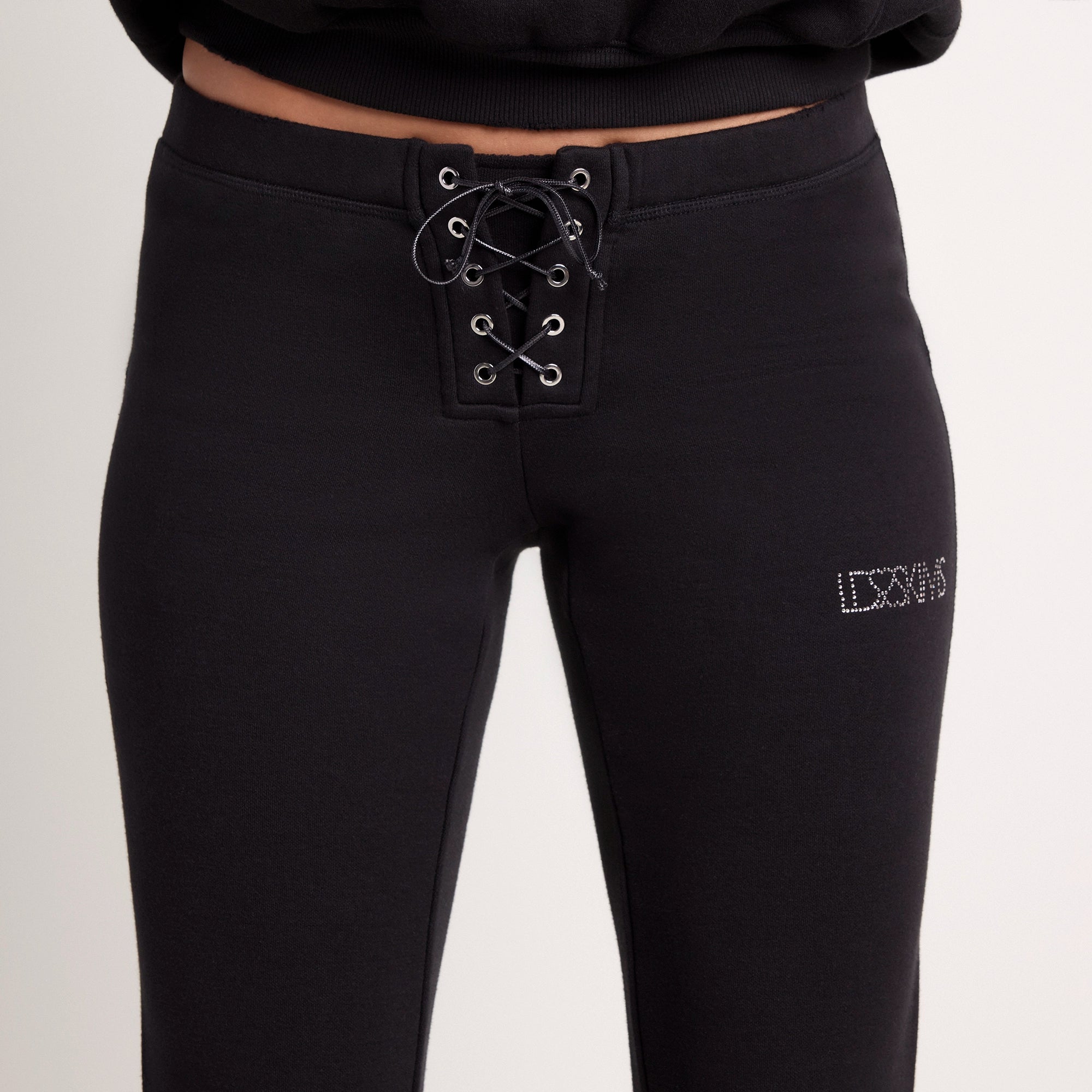 LUDOVIC DE SAINT SERNIN X SKIMS COTTON FLEECE SLIM PANT | ONYX ON A MODEL SIDE VIEW @ | FOCUS: 0.0, 1.0, 0.9