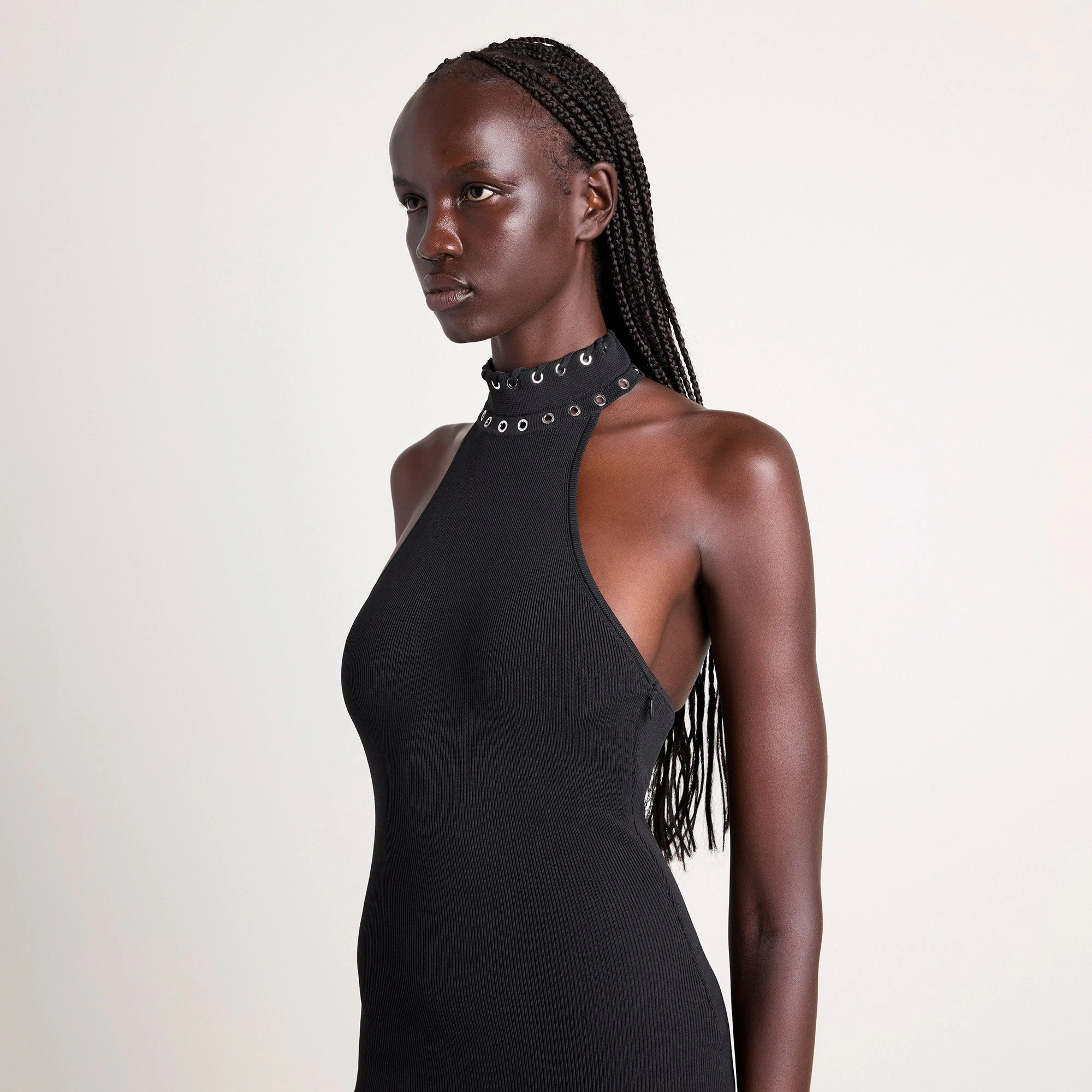 LUDOVIC DE SAINT SERNIN X SKIMS REFINED KNIT MOCK NECK HALTER DRESS | ONYX ON A MODEL SIDE VIEW @ | FOCUS: 0.0, 1.0, 0.9
