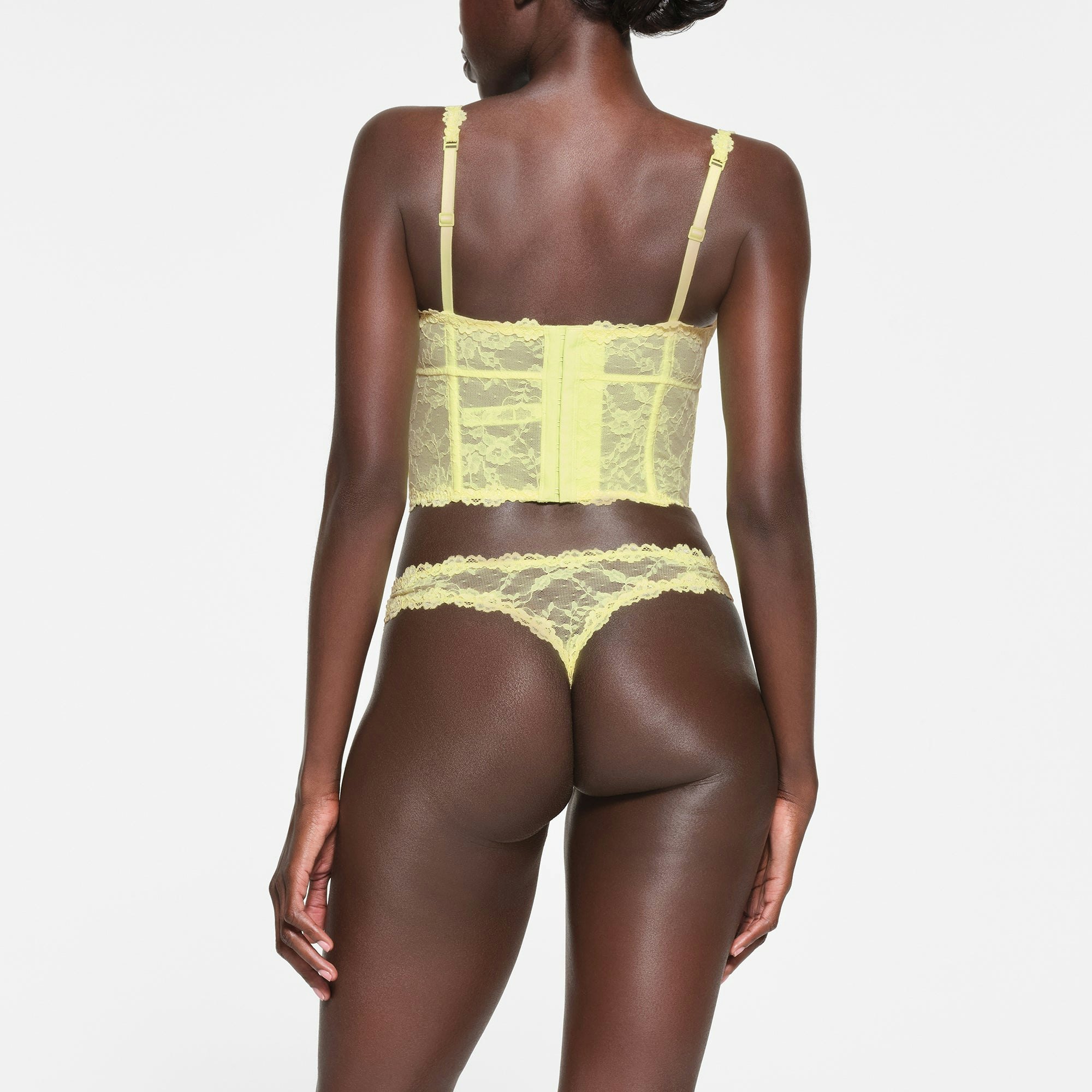 STRETCH LACE CORSET | LEMONADE ON A MODEL BACK VIEW