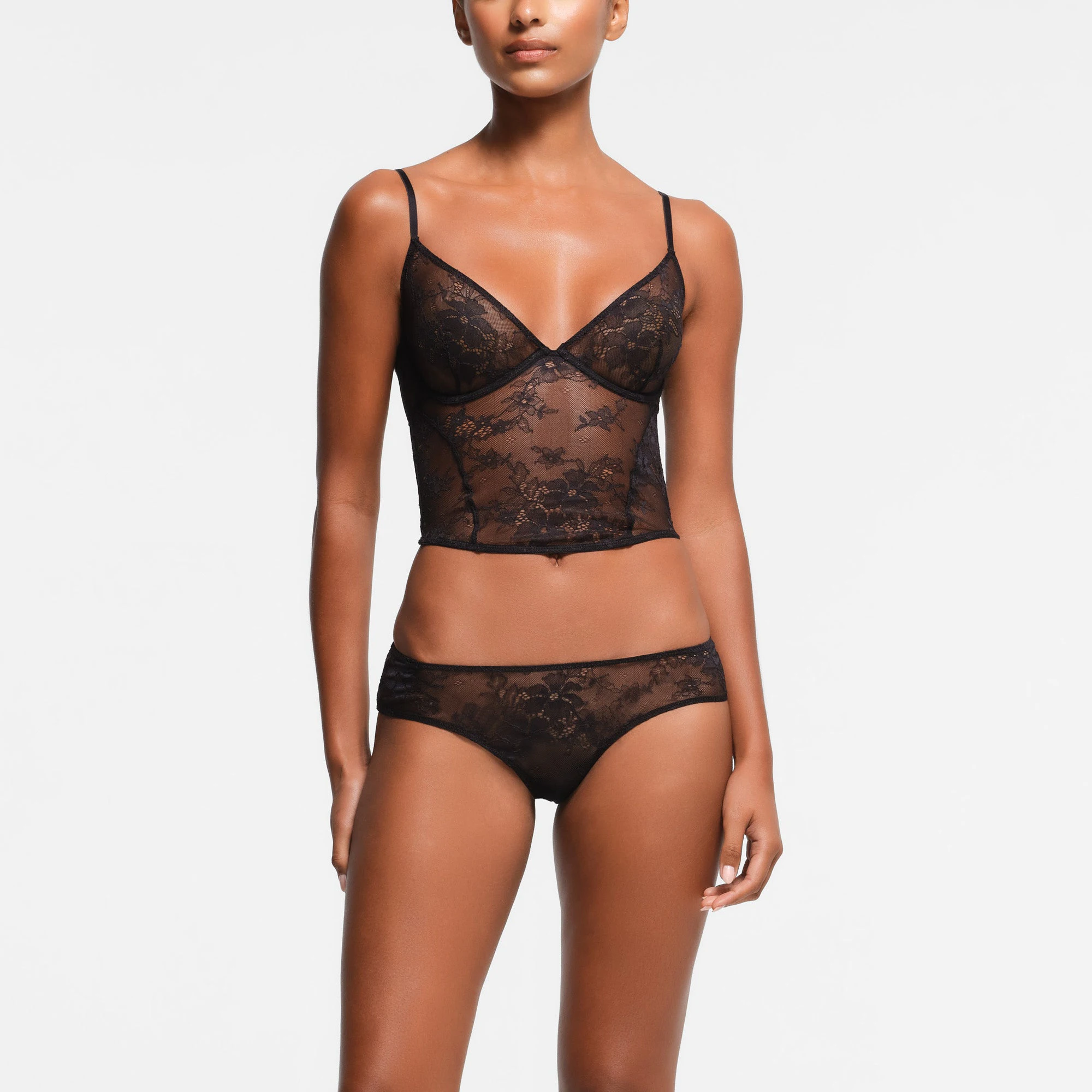 ULTRA FINE LACE PLUNGE CORSET | ONYX ON A MODEL FRONT VIEW