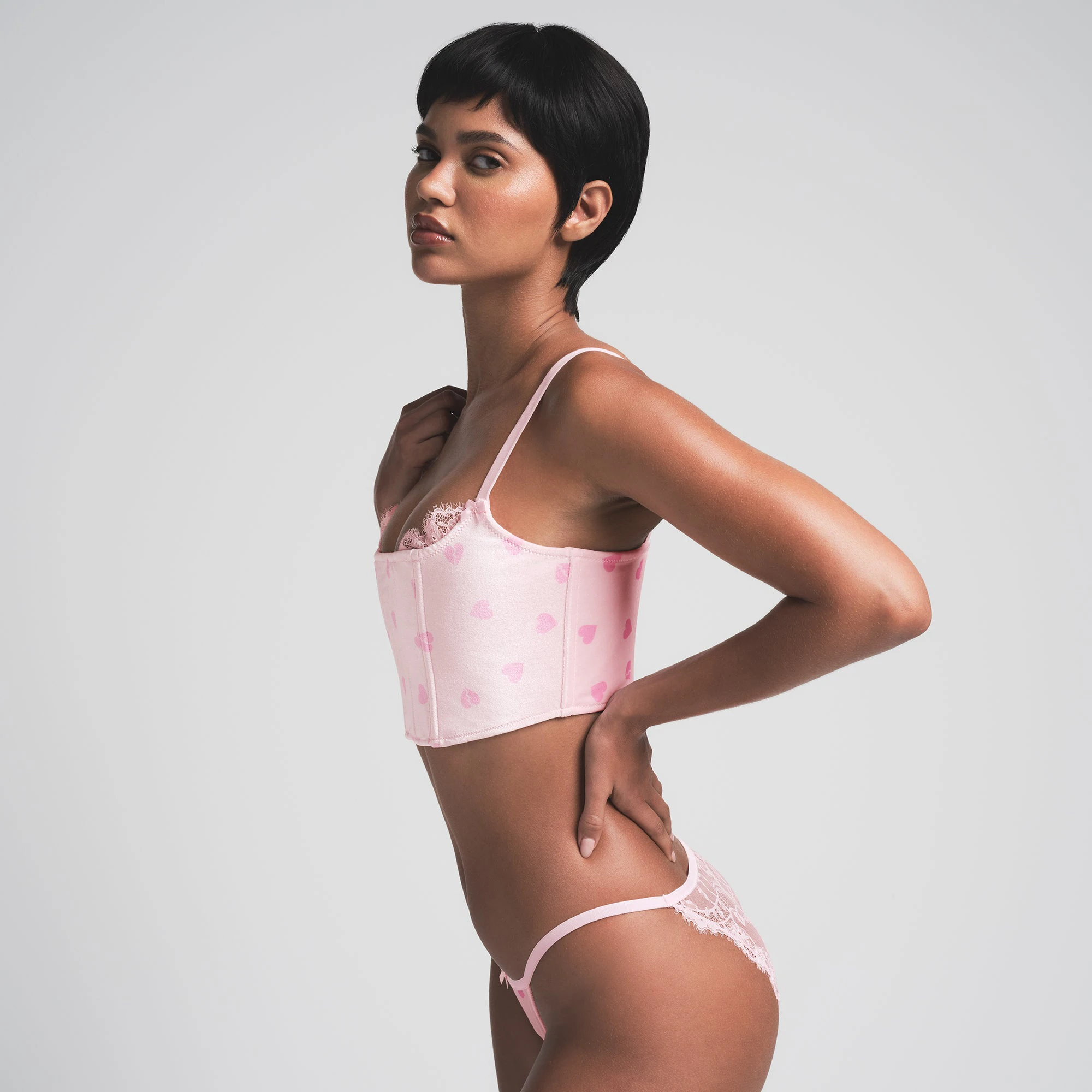 VELVET LACE CROPPED CORSET | CHERRY BLOSSOM HEART BREAKER ON A MODEL SIDE VIEW | FOCUS: 0.0, 1.0, 0.9