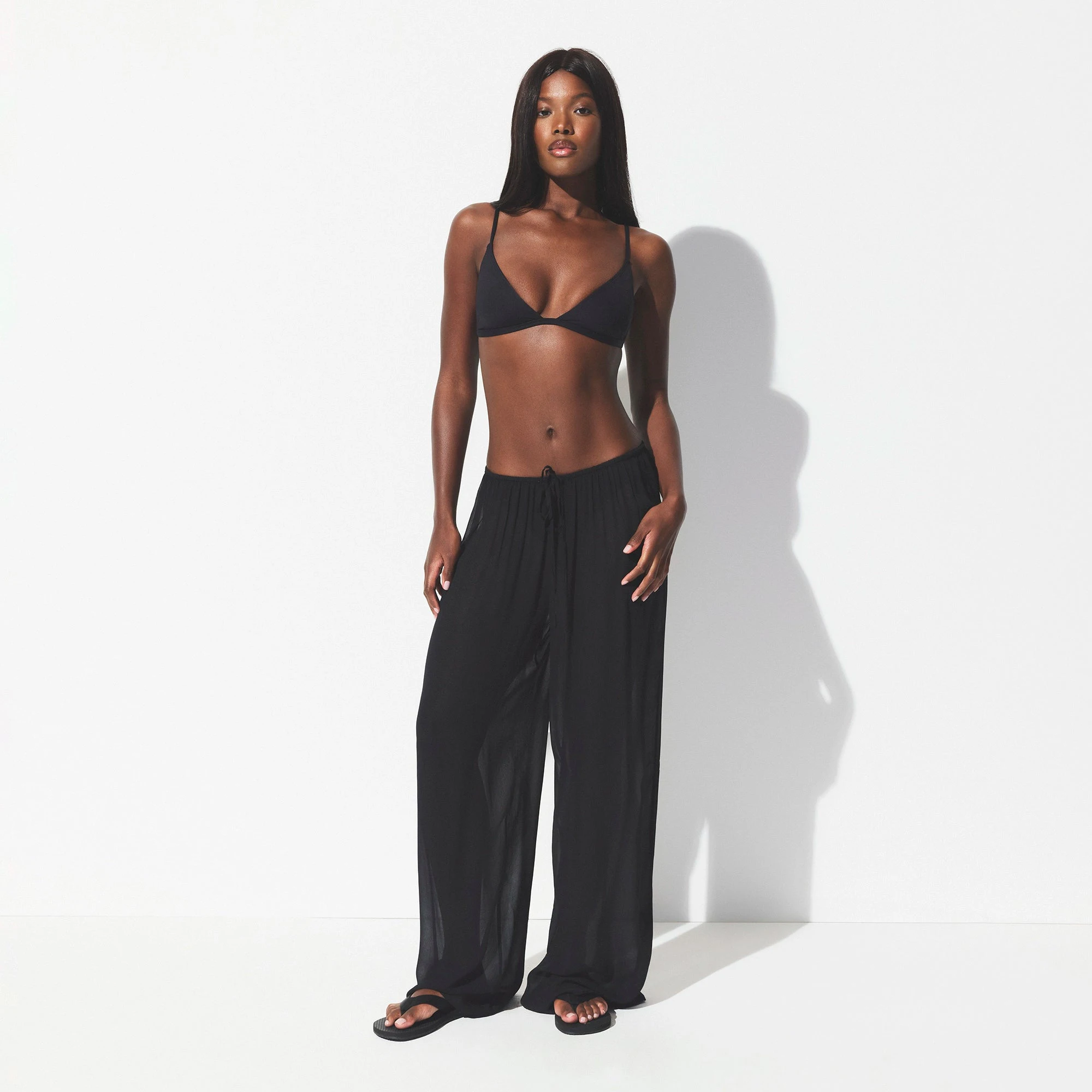 SHEER COVER-UPS PANT | OBSIDIAN ON A MODEL FRONT VIEW @ | FOCUS: 0.0, 1.0, 0.9