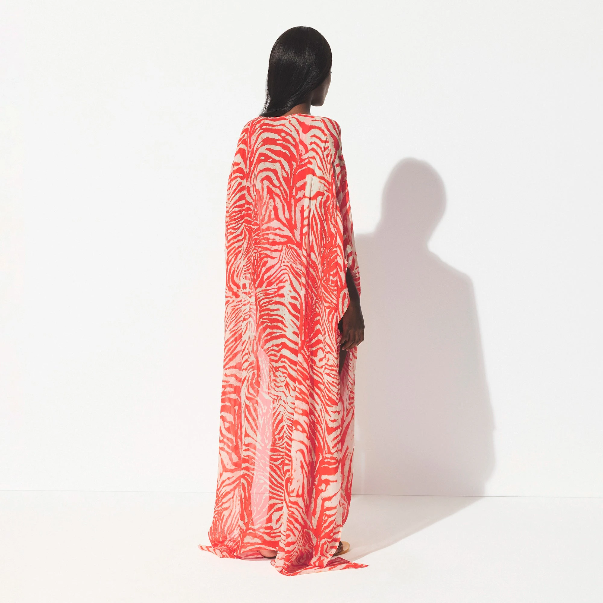 SHEER COVER-UPS LONG KAFTAN | CARMINE ZEBRA PRINT ON A MODEL SIDE VIEW @ | FOCUS: 0.0, 1.0, 0.9