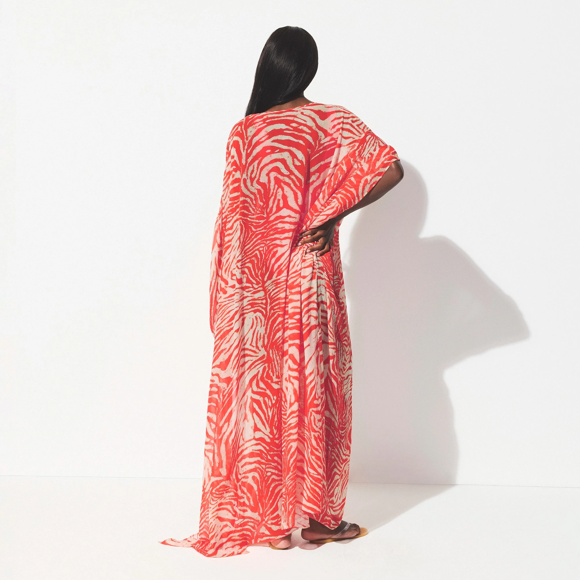 SHEER COVER-UPS LONG KAFTAN | CARMINE ZEBRA PRINT ON A MODEL SIDE VIEW @ | FOCUS: 0.0, 1.0, 0.9