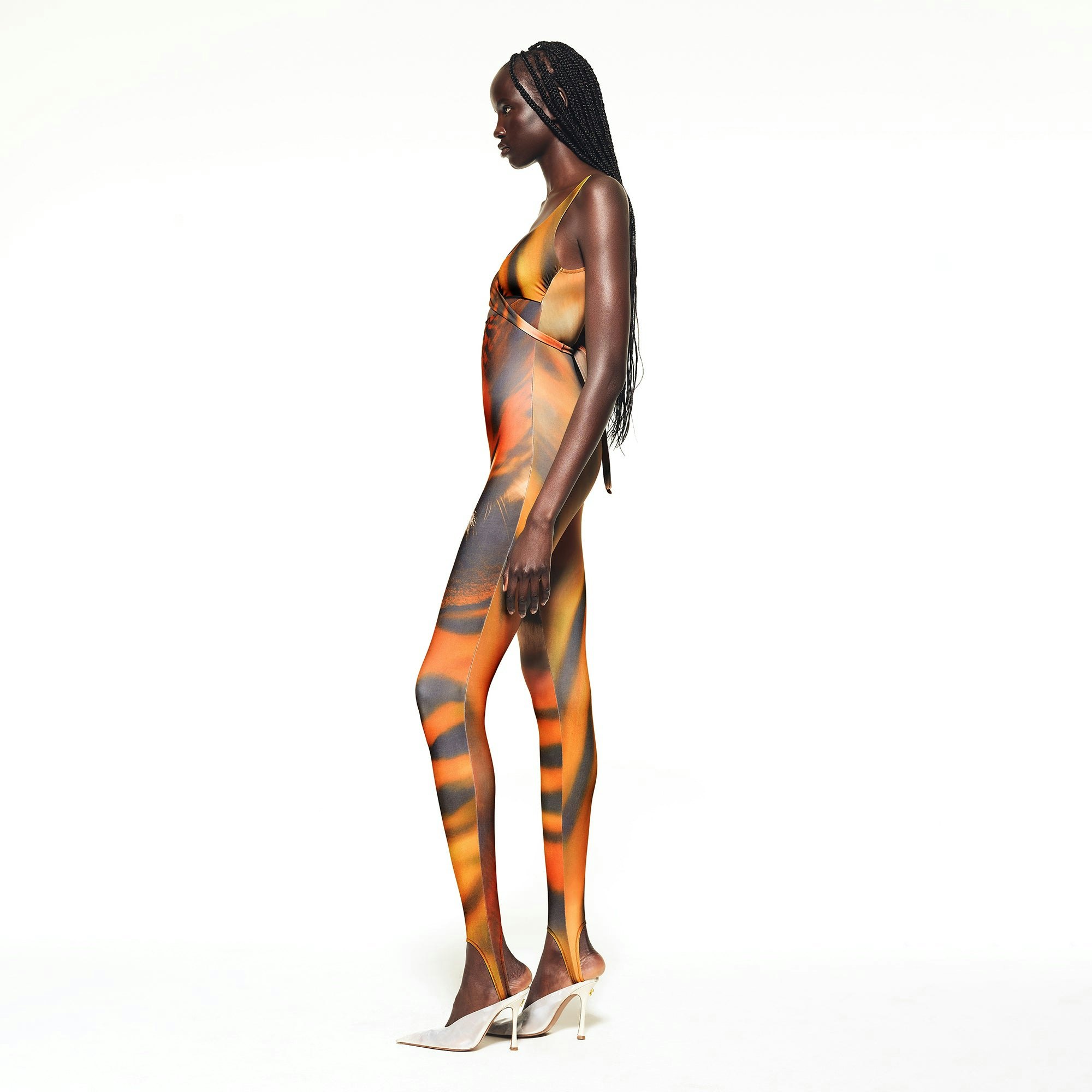 ROBERTO CAVALLI X SKIMS WRAP CATSUIT | TIGER FACE PRINT ON A MODEL SIDE VIEW | FOCUS: 0.0, 1.0, 0.9