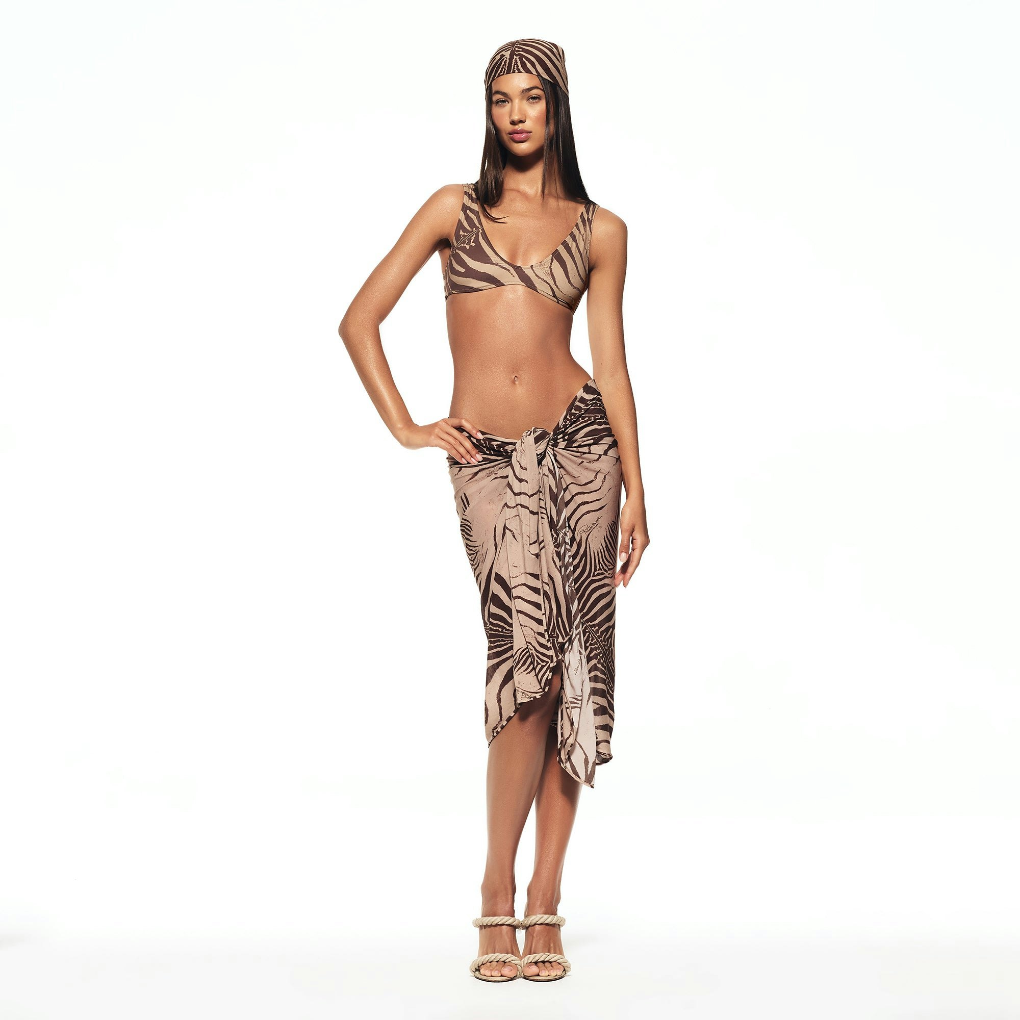 ROBERTO CAVALLI X SKIMS SARONG | ZEBRA PRINT ON A MODEL FRONT VIEW | FOCUS: 0.0, 1.0, 0.9