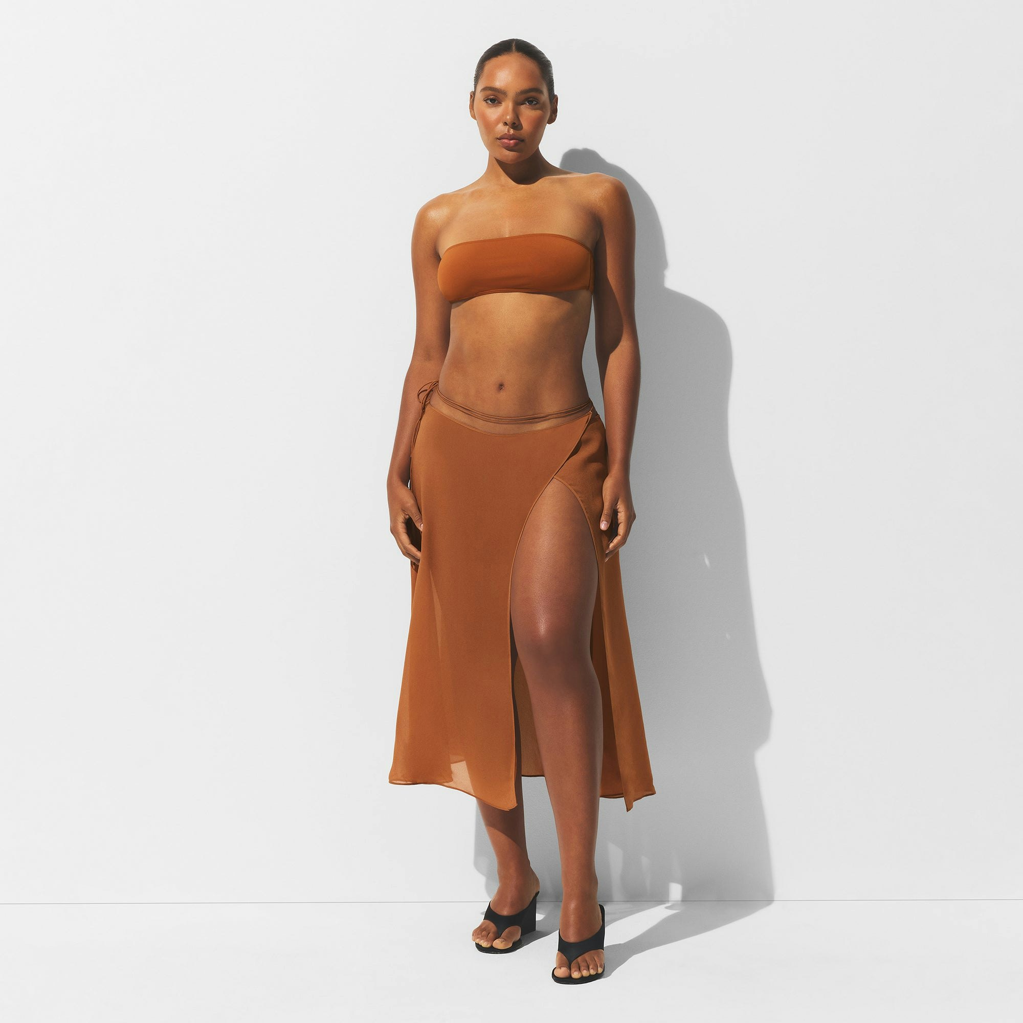 MINIMAL SWIM COVER UP MIDI SKIRT | CHESTNUT ON A MODEL FRONT VIEW | FOCUS: 0.0, 1.0, 0.9