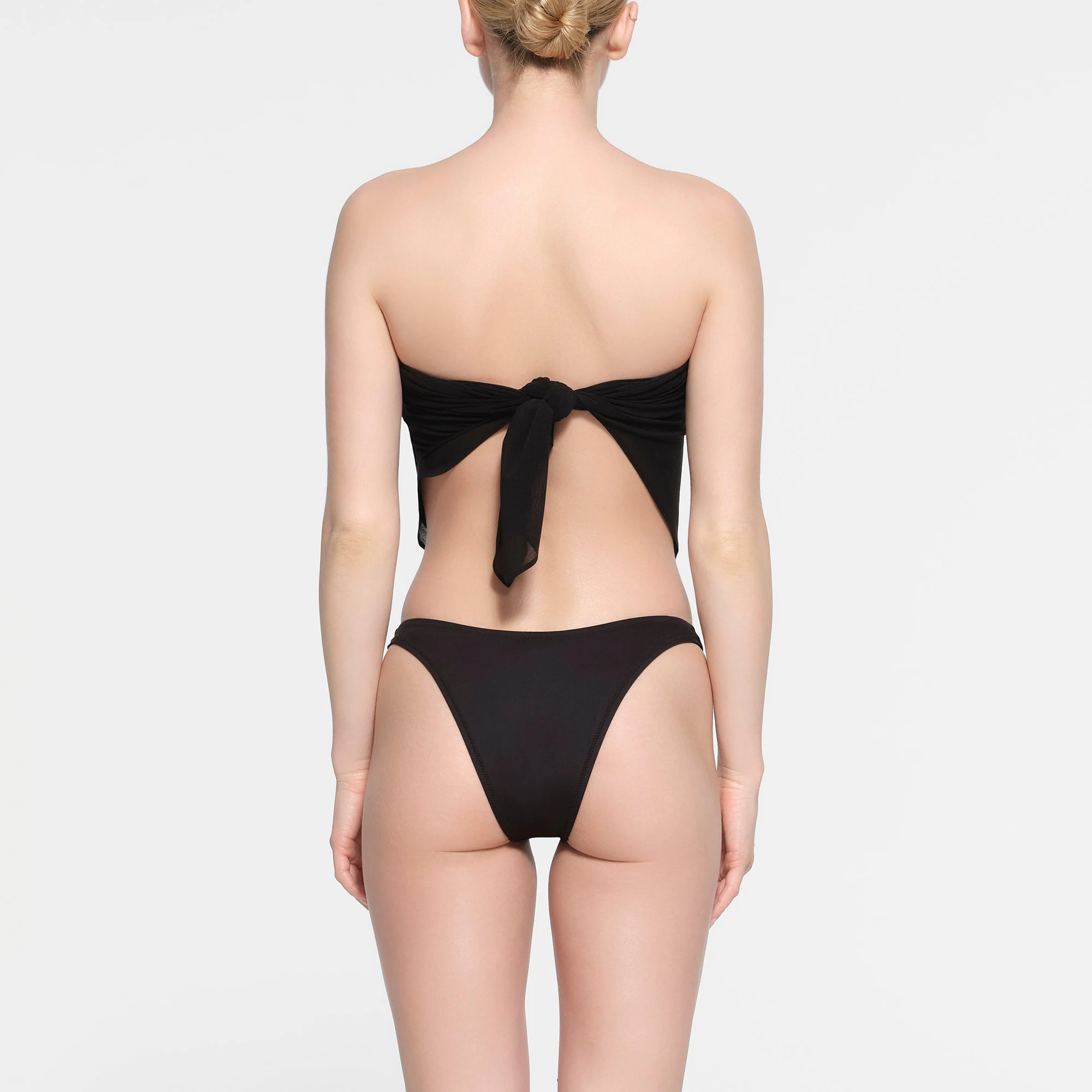 SUMMER MESH COVER UP HANDKERCHIEF TOP | ONYX ON A MODEL BACK VIEW