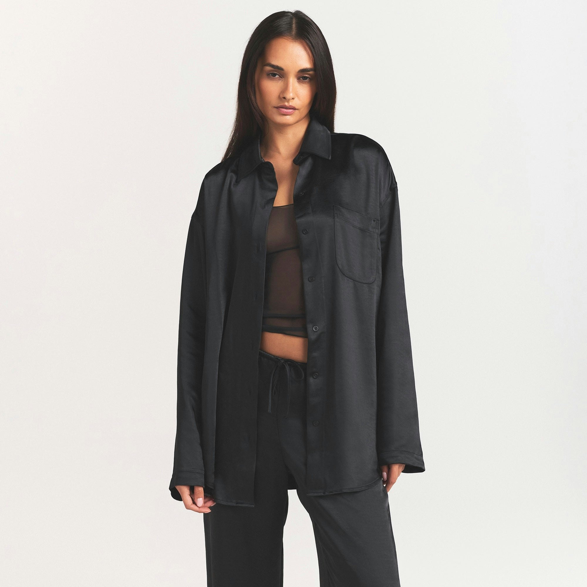 LIGHTWEIGHT SATIN OVERSIZED SHIRT | OBSIDIAN ON A MODEL FRONT VIEW @ | FOCUS: 0.0, 1.0, 0.9