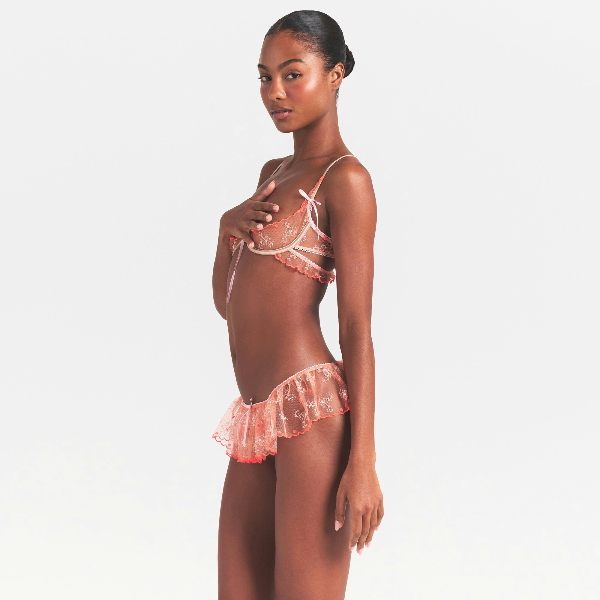 EMBROIDERED TULLE SKIMPY BRA | GUAVA HEART TULLE ON A MODEL SIDE VIEW @ | FOCUS: 0.0, 1.0, 0.9
