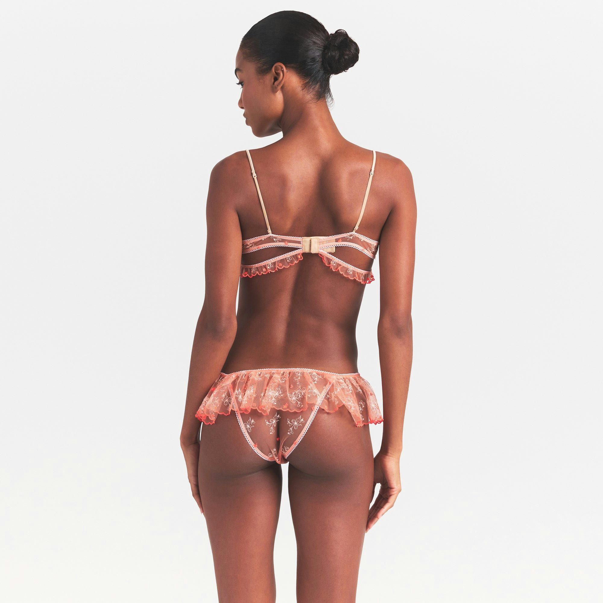 EMBROIDERED TULLE SKIMPY BRA | GUAVA HEART TULLE ON A MODEL SIDE VIEW @ | FOCUS: 0.0, 1.0, 0.9