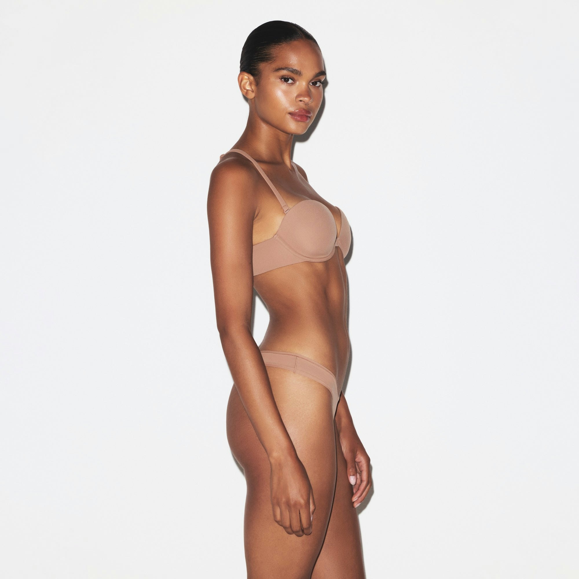 FITS EVERYBODY RACERBACK DEMI BRA | SIENNA ON A MODEL SIDE VIEW @ | FOCUS: 0.0, 1.0, 0.9