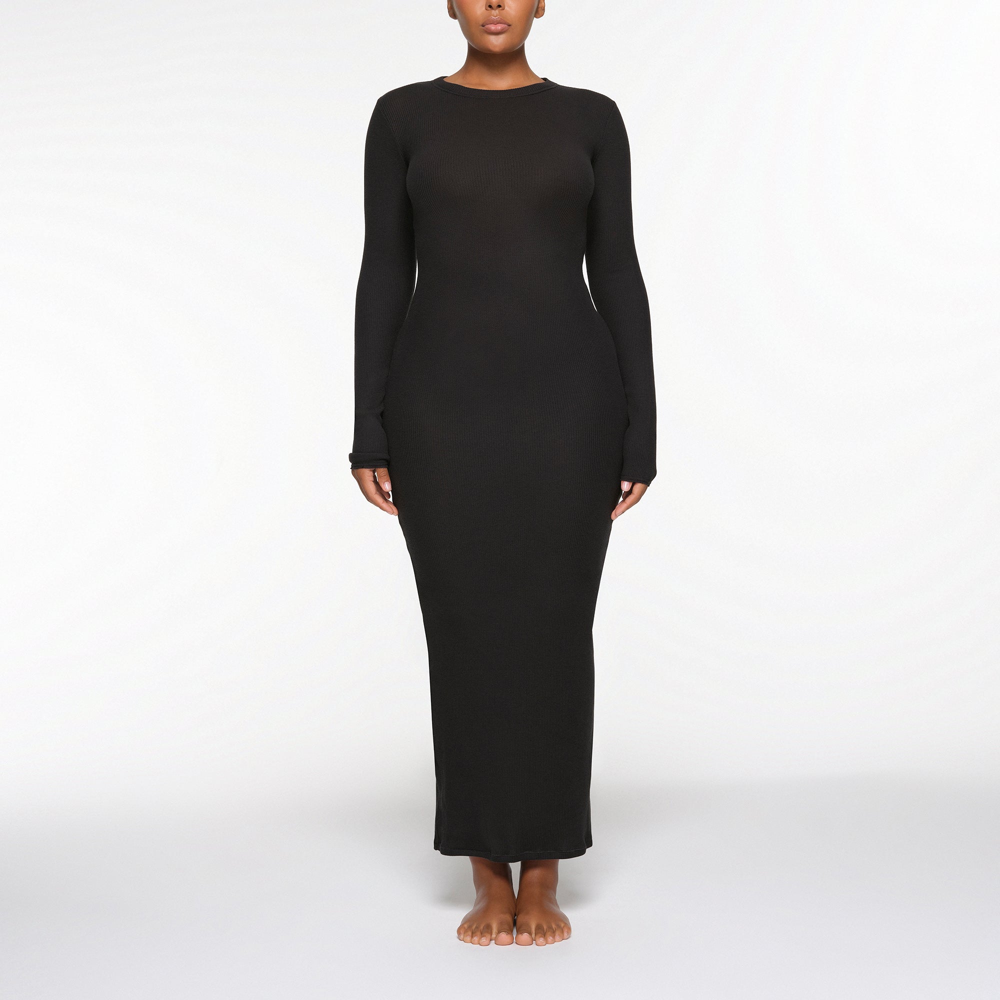 WAFFLE CREW NECK LONG DRESS WORN BY A MODEL IN FRONT VIEW