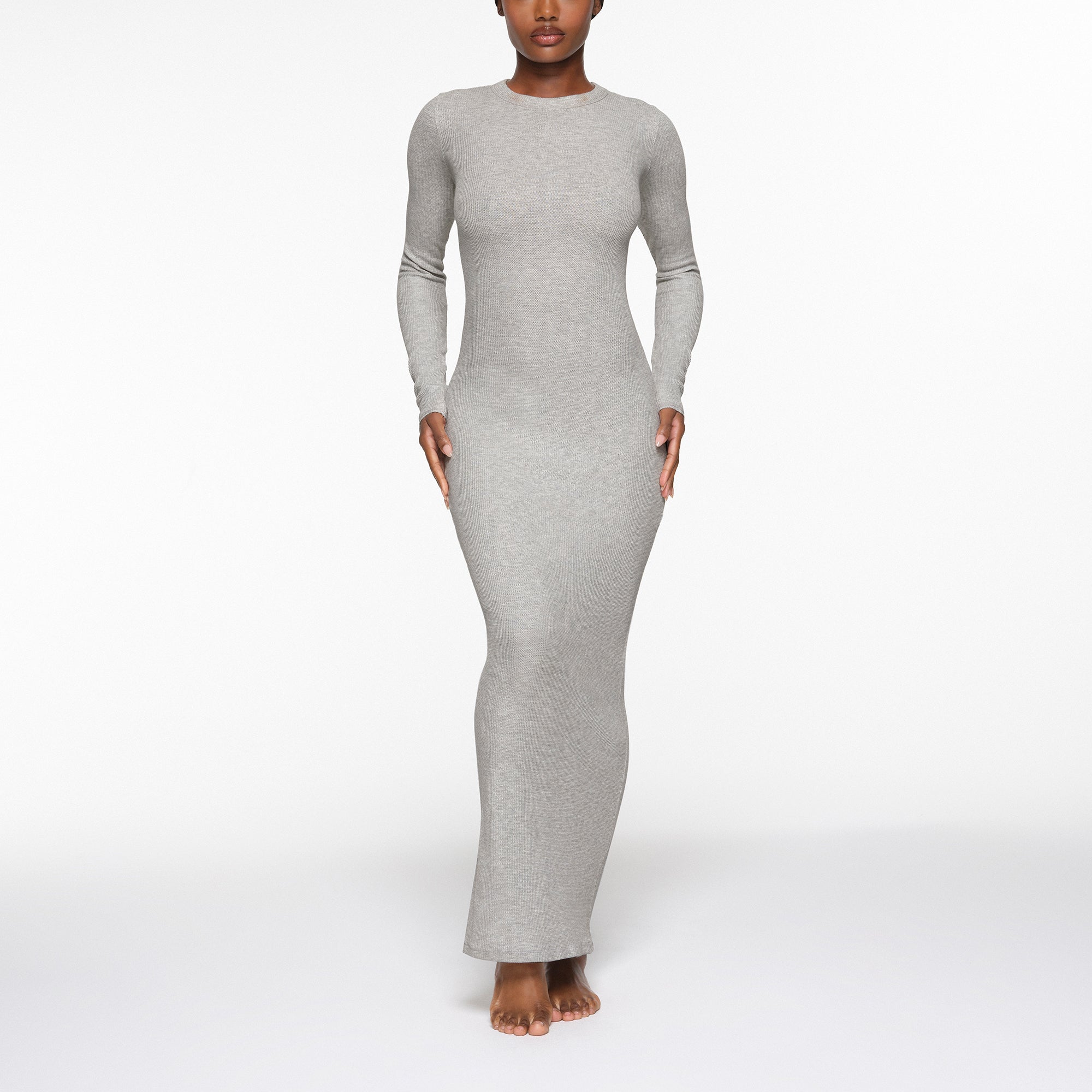 WAFFLE CREW NECK LONG DRESS WORN BY A MODEL IN FRONT VIEW