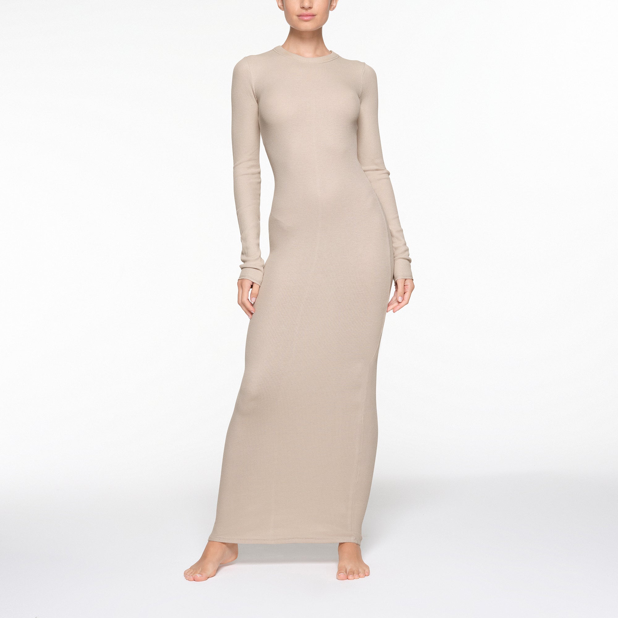 WAFFLE CREW NECK LONG DRESS WORN BY A MODEL IN FRONT VIEW