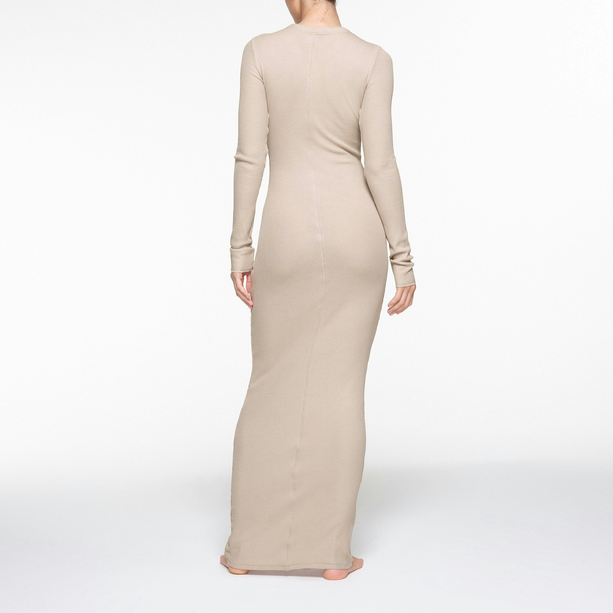 WAFFLE CREW NECK LONG DRESS ON A MODEL BACK VIEW