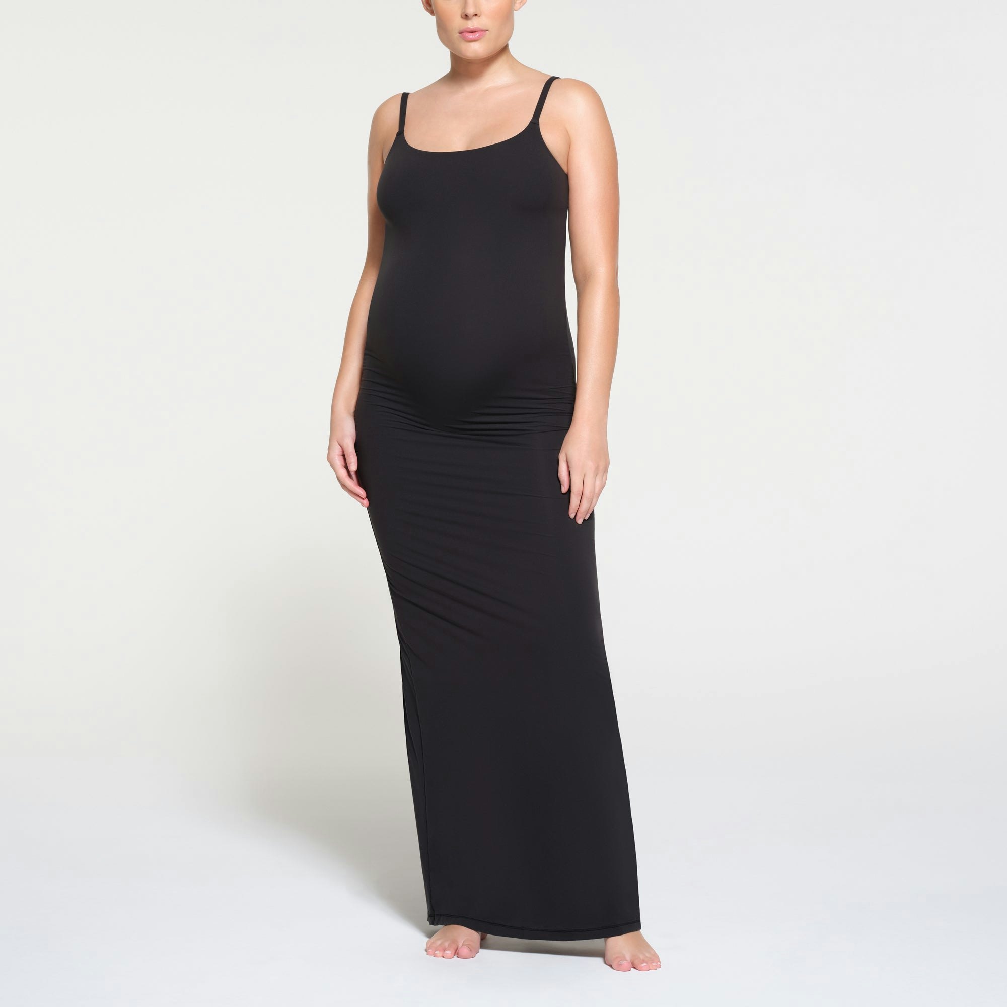 FITS EVERYBODY MATERNITY LONG SLIP DRESS | ONYX ON A MODEL FRONT VIEW