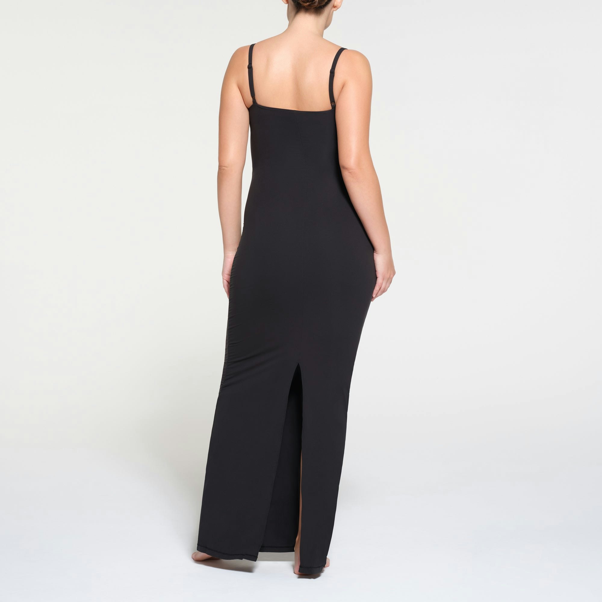FITS EVERYBODY MATERNITY LONG SLIP DRESS | ONYX ON A MODEL BACK VIEW