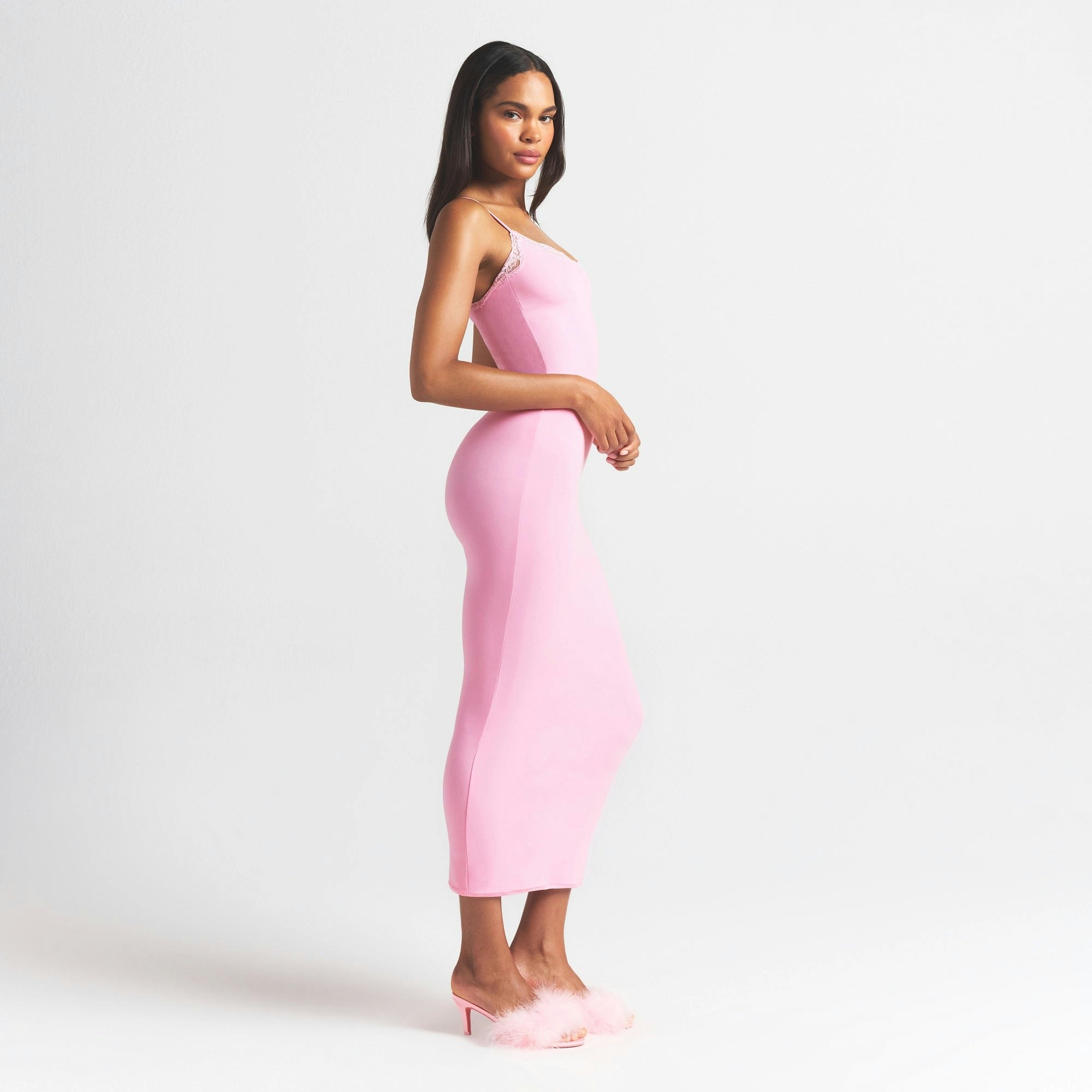 FITS EVERYBODY LACE LONG SLIP DRESS | BUBBLE GUM TONAL ON A MODEL FRONT VIEW