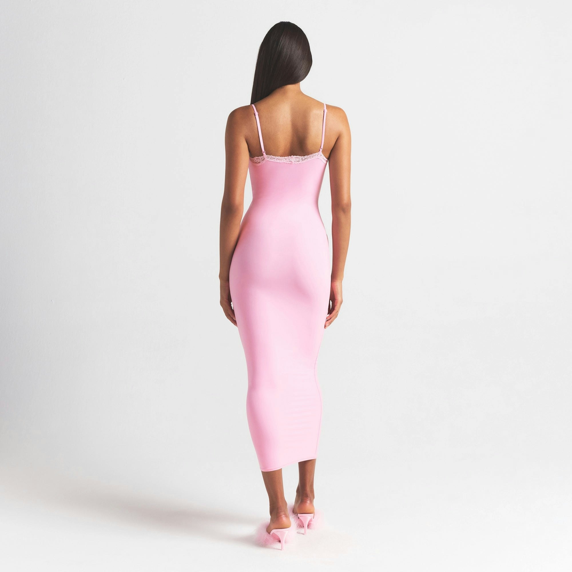 FITS EVERYBODY LACE LONG SLIP DRESS | BUBBLE GUM TONAL ON A MODEL FRONT VIEW