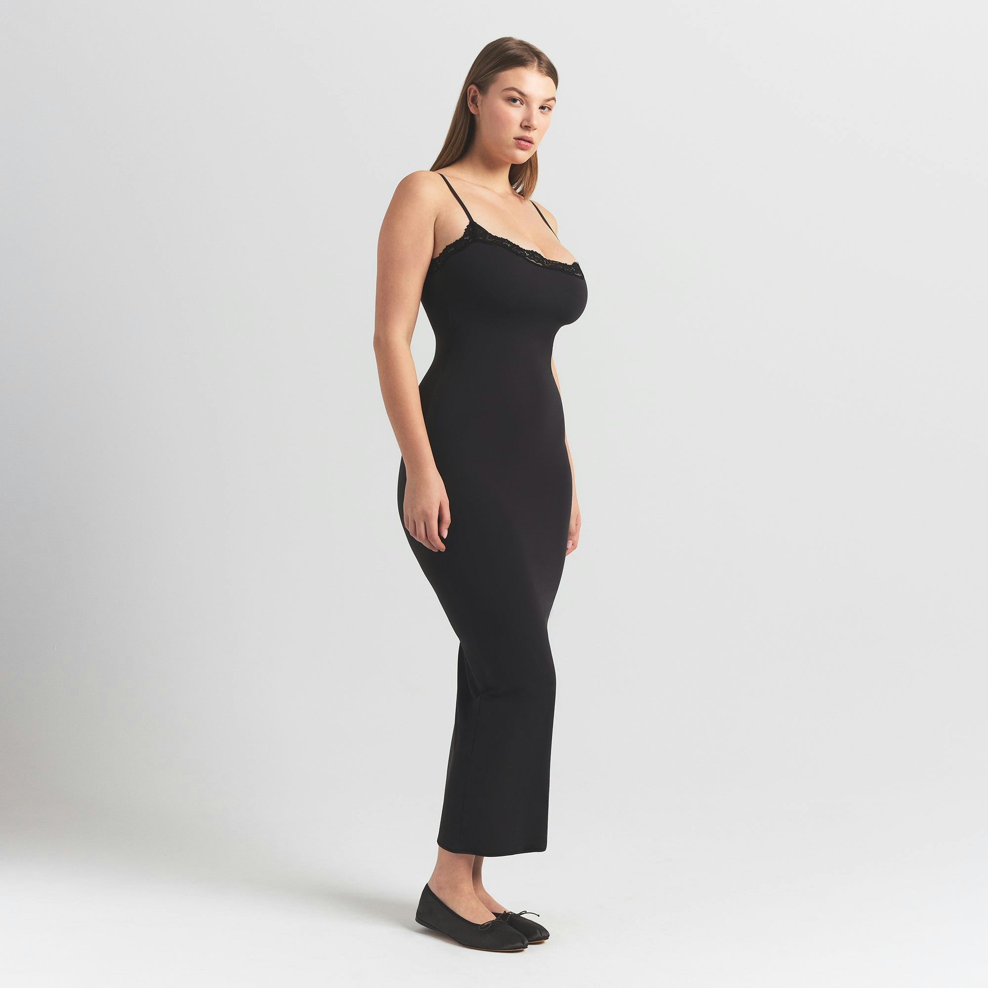 FITS EVERYBODY LACE LONG SLIP DRESS | ONYX ON A MODEL SIDE VIEW @ | FOCUS: 0.0, 1.0, 0.9