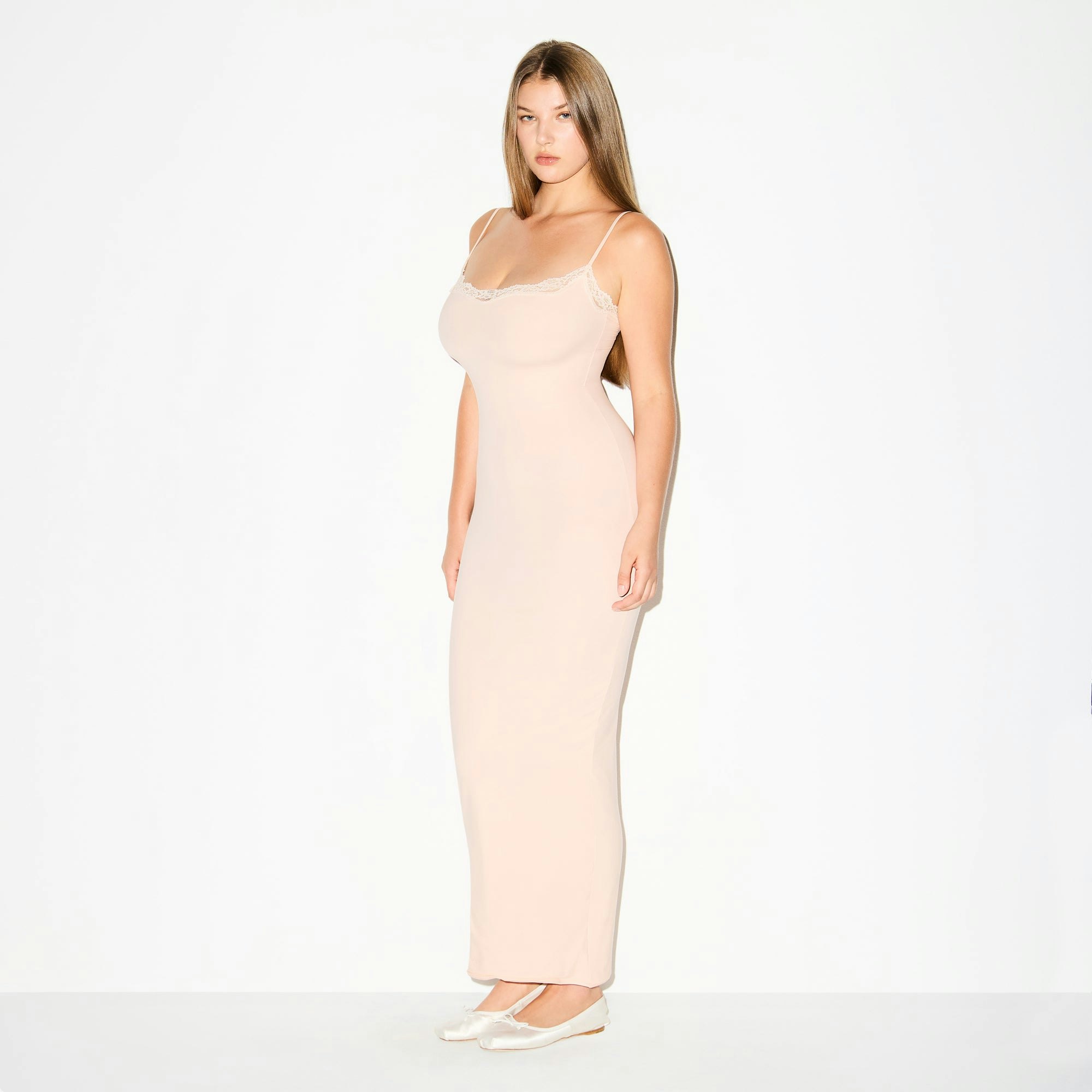 FITS EVERYBODY LACE LONG SLIP DRESS | PRIMROSE ON A MODEL FRONT VIEW @ | FOCUS: 0.0, 1.0, 0.9