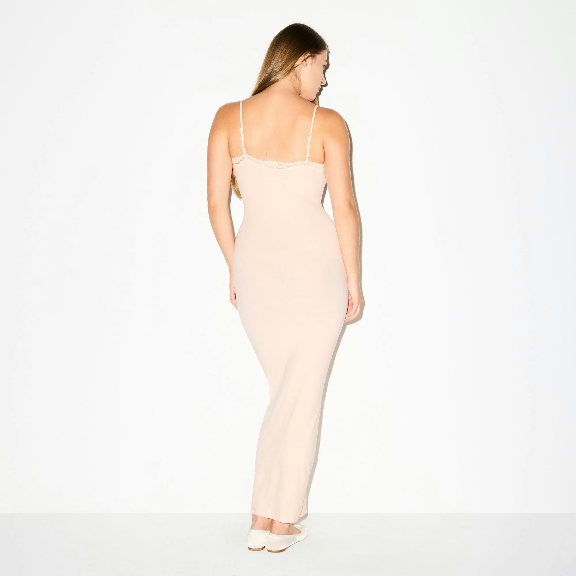 FITS EVERYBODY LACE LONG SLIP DRESS | PRIMROSE ON A MODEL FRONT VIEW @ | FOCUS: 0.0, 1.0, 0.9