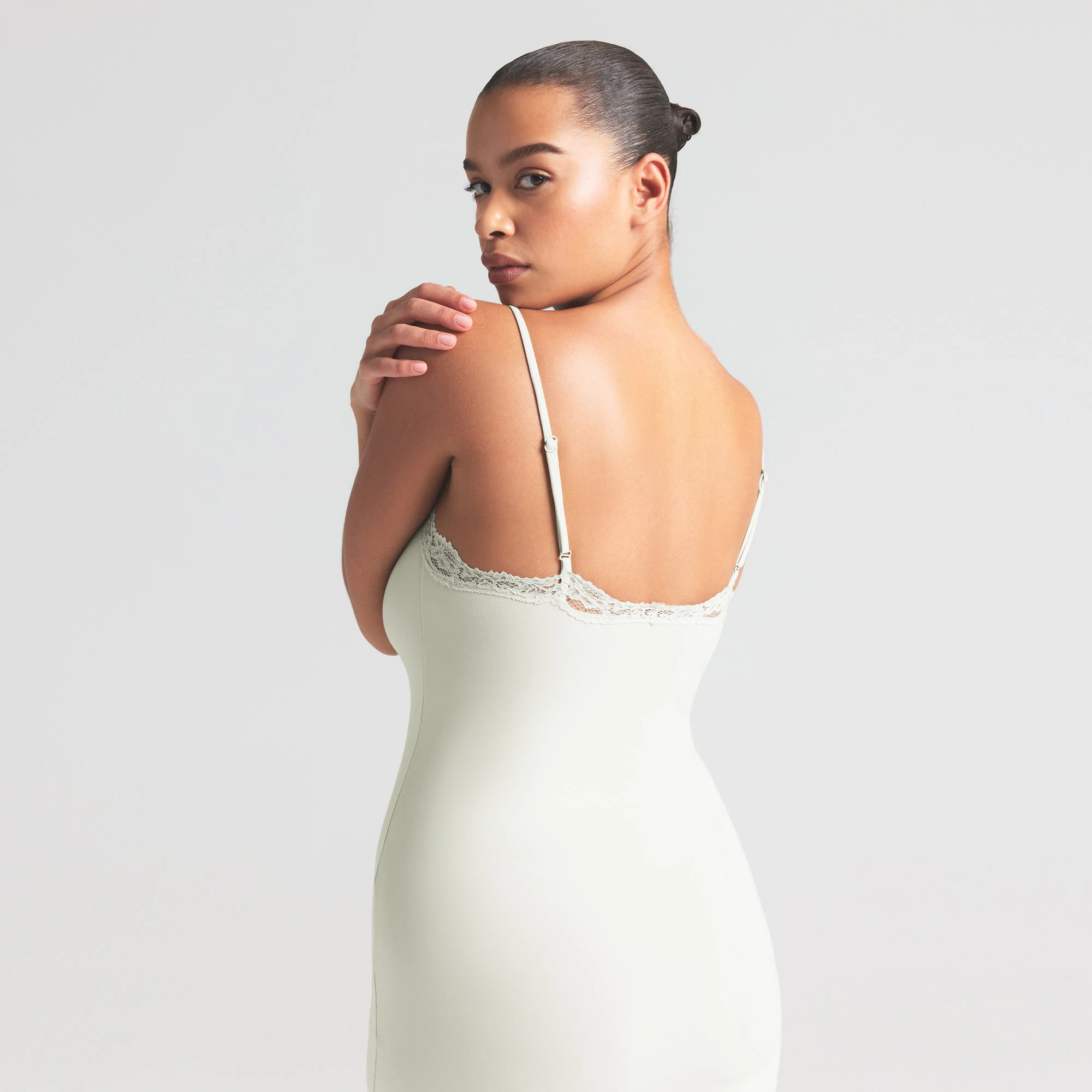 FITS EVERYBODY LACE LONG SLIP DRESS | SPEARMINT ON A MODEL SIDE VIEW | FOCUS: 0.0, 1.0, 0.9