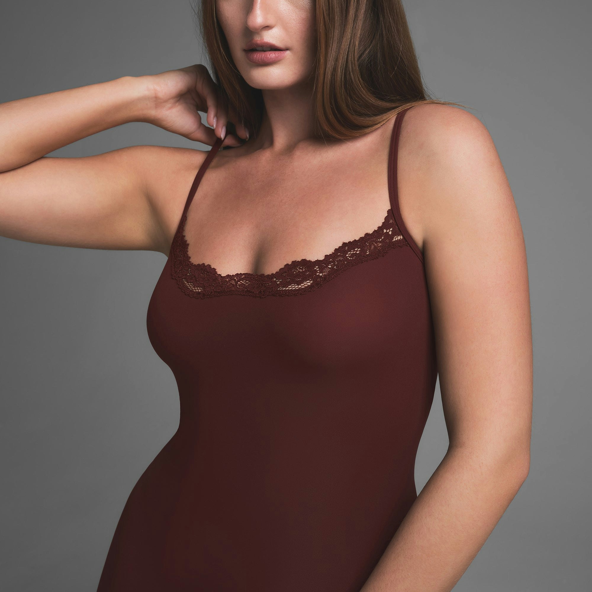 FITS EVERYBODY LACE SLIP DRESS | OXBLOOD ON A MODEL SIDE VIEW